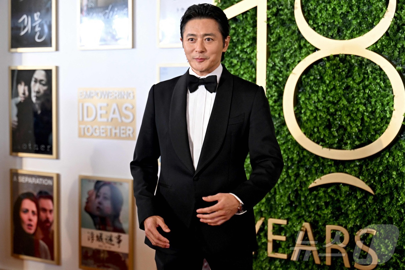 (홍콩 AFP=뉴스1) 우동명 기자 = 배우 장동건이 16일(현지시간) 홍콩에서 열린 아시아 필름 어워즈 시상식의 레드 카펫에 도착을 하고 있다. 2025.03.17ⓒ AFP=뉴스 …