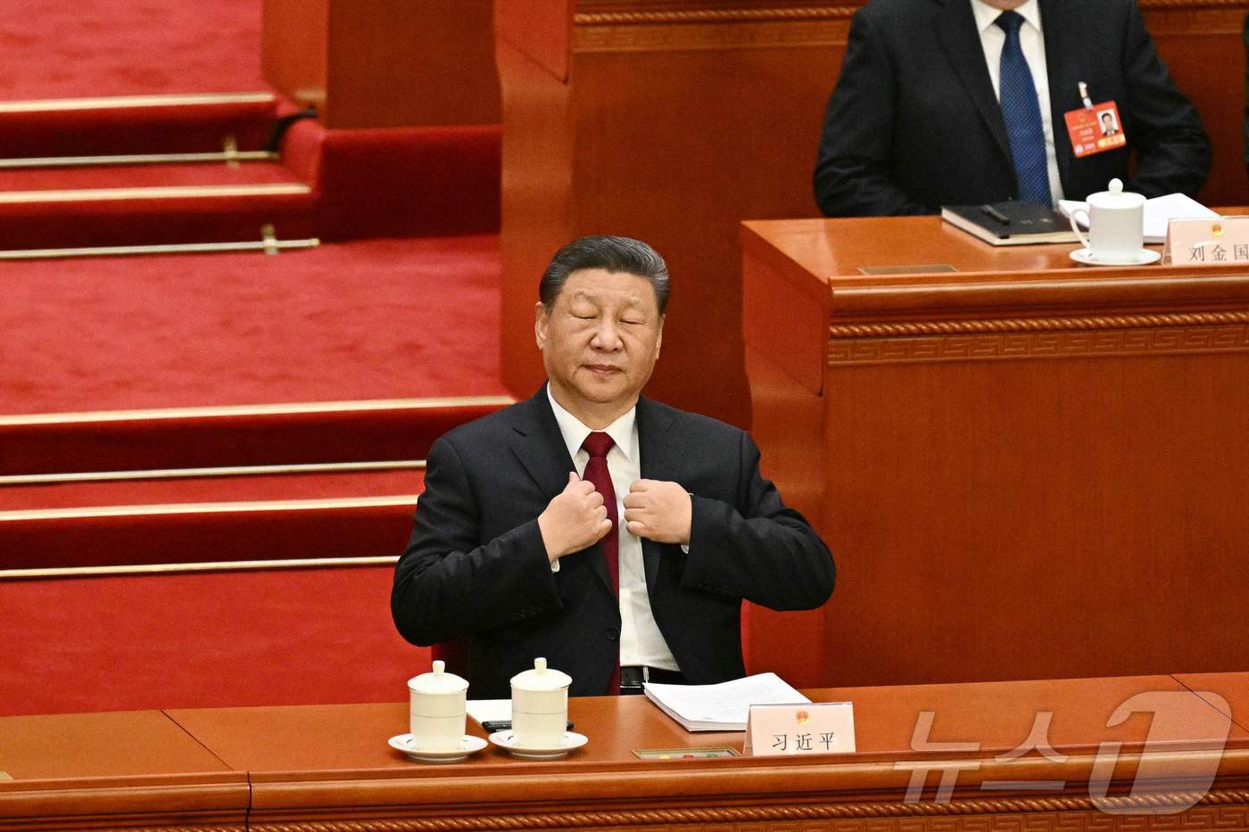 (베이징 AFP=뉴스1) 우동명 기자 = 시진핑 중국 국가 주석이 5일(현지시간) 베이징 인민대회당에서 열린 전국인민대표대회(전인대) 개막식에 참석을 하고 있다. 2025.03.0 …