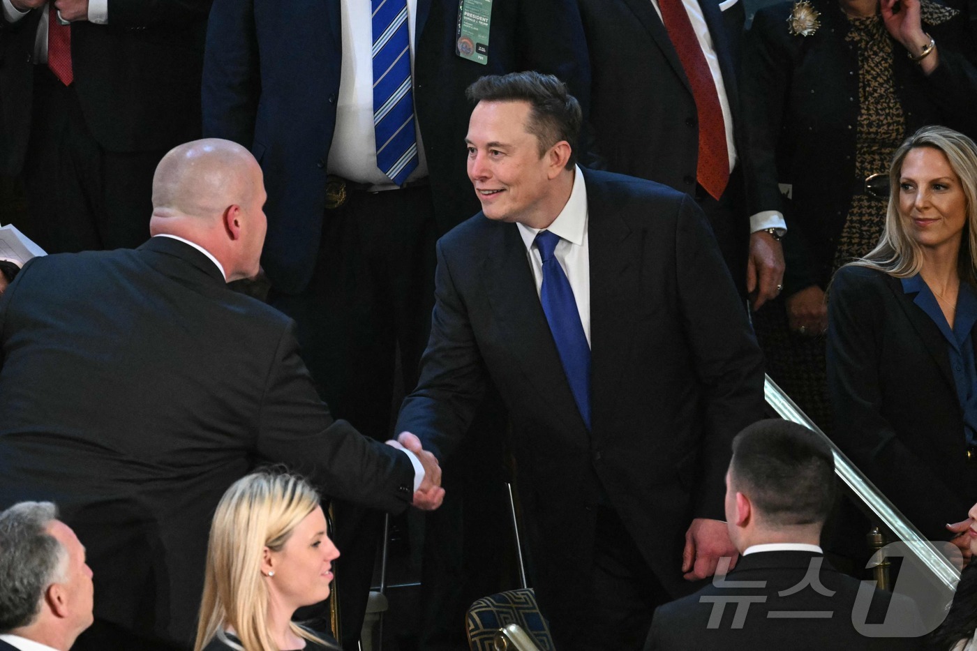 (워싱턴DC AFP=뉴스1) 정지윤 기자 = 4일(현지시간) 미국 워싱턴DC  연방의회 의사당에서 도널드 트럼프 미국 대통령의 연설이 예정된 가운데 일론 머스크 테슬라 최고경영자( …
