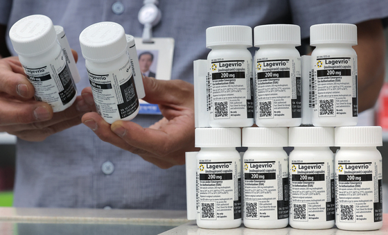 코로나 관련주, 이상 급등 후 하락…신풍제약 10%↓ [핫종목]