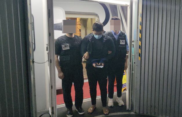 '종이의 집' 흉내로 111억 규모 리딩방 사기…총책 강제송환