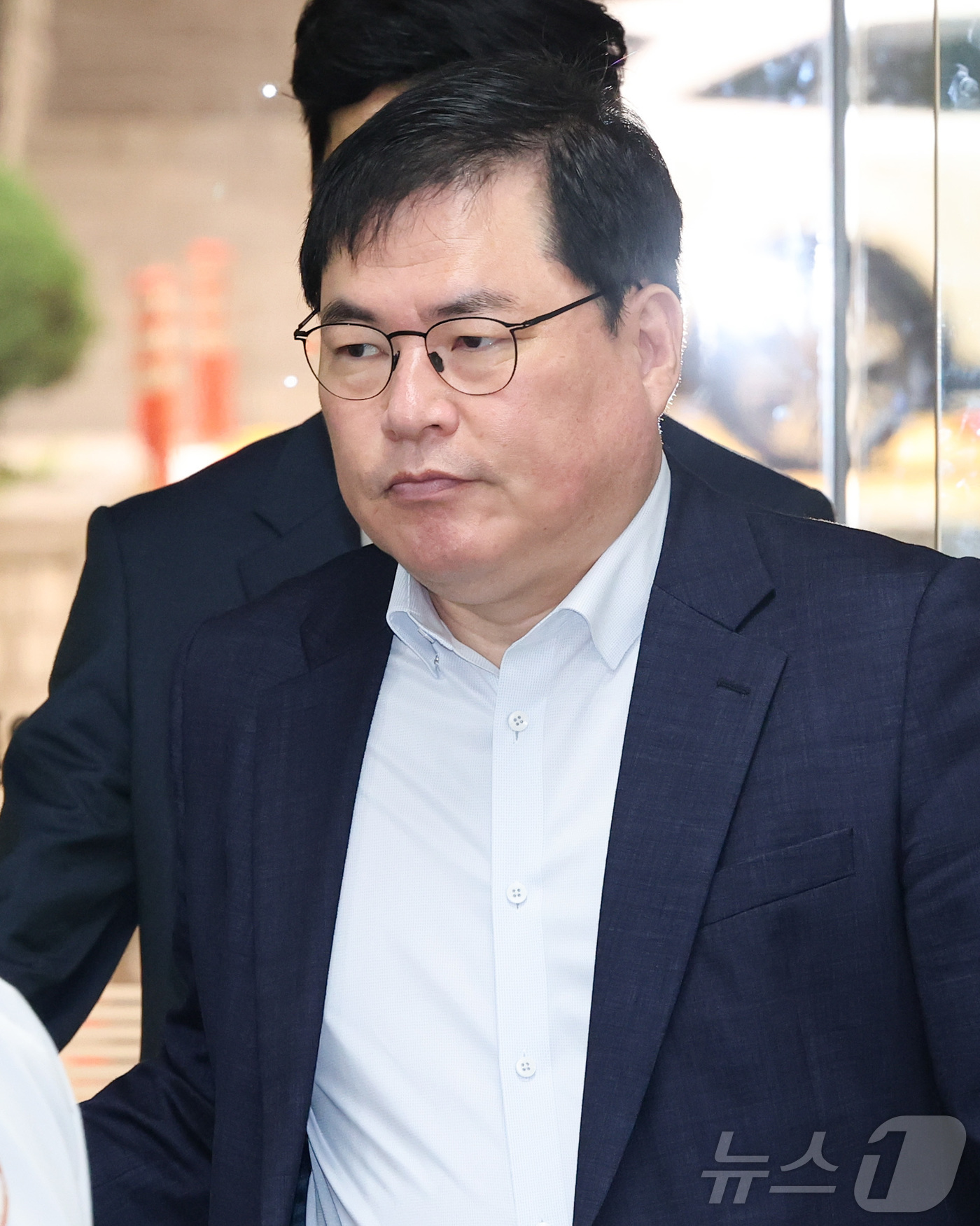 (서울=뉴스1) 민경석 기자 = 유동규 전 성남도시개발공사 기획본부장이 30일 오전 서울 서초구 서울중앙지방법원에서 열린 대장동 개발 특혜 혐의 민간업자 재판 결심공판에 출석하고 …