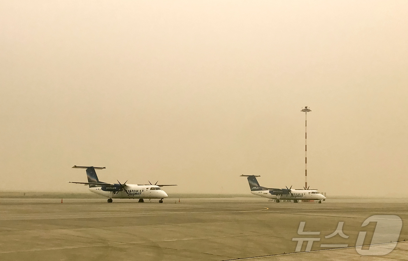 (야쿠츠크 로이터=뉴스1) 강민경 기자 = 러시아 야쿠츠크 공항에 착륙한 항공기들. (자료사진) 2021.8.12ⓒ 로이터=뉴스1