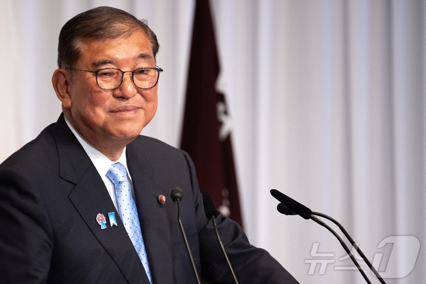 본문 이미지 - 21일 이시바 시게루 일본 총리가 참의원 선거에서 패배한 직후 자민당 본부에서 기자회견을 하고 있다. 2025.07.21 ⓒ 로이터=뉴스1 ⓒ News1 김지완 기자