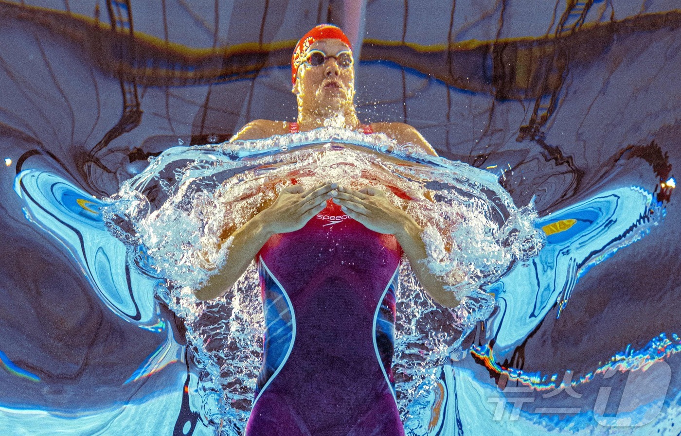 (싱가포르 AFP=뉴스1) 권영미 기자 = 영국의 수영 선수 앙하라드 에반스가 28일 싱가포르에서 열린 세계수영선수권대회 여자 100m 평영 예선에서 경기를 펼치고 있다.2025. …