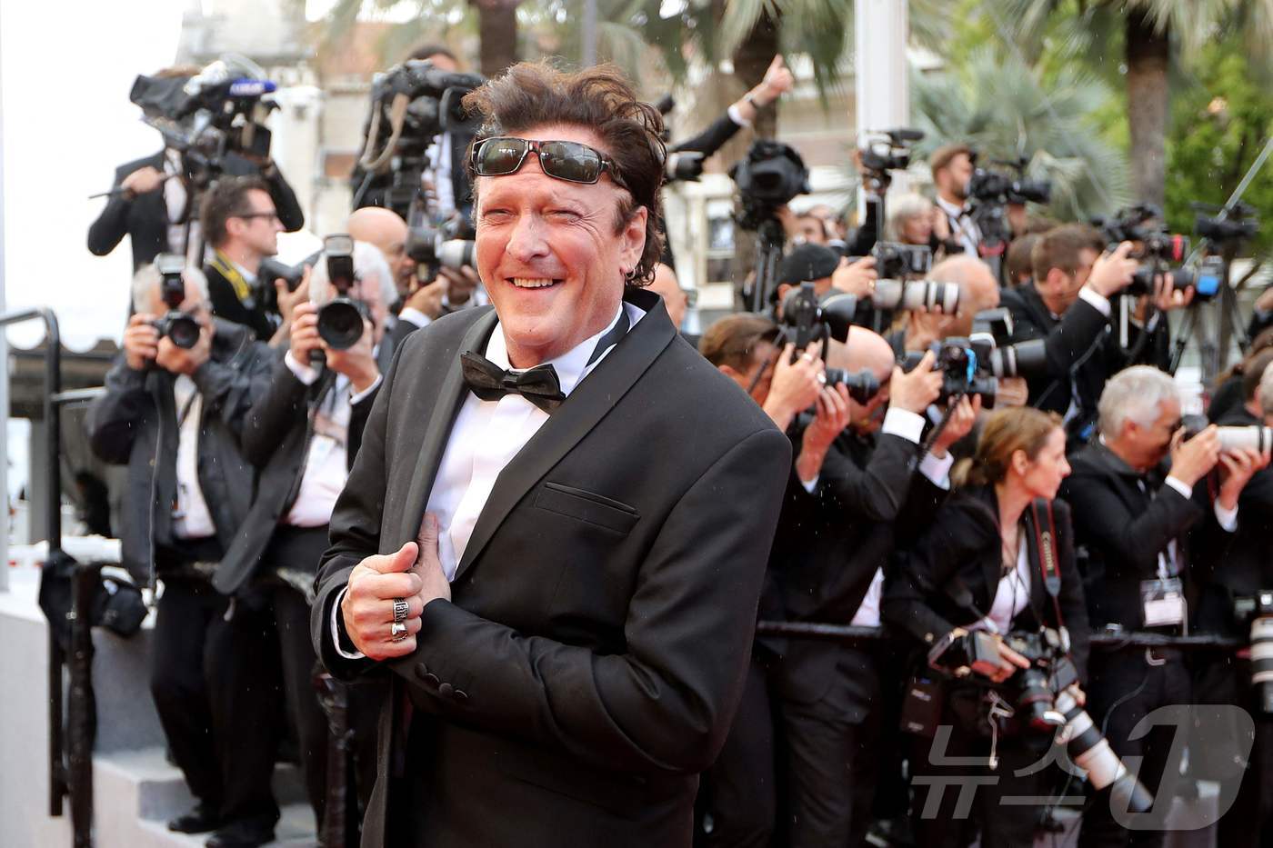 (칸 AFP=뉴스1) 권영미 기자 = '저수지의 개들' '킬 빌' 등에 출연한 미국 영화배우 마이클 매드슨이 2018년 5월14일 칸영화제 행사장에 도착하는 모습. 3일(현지시간) …