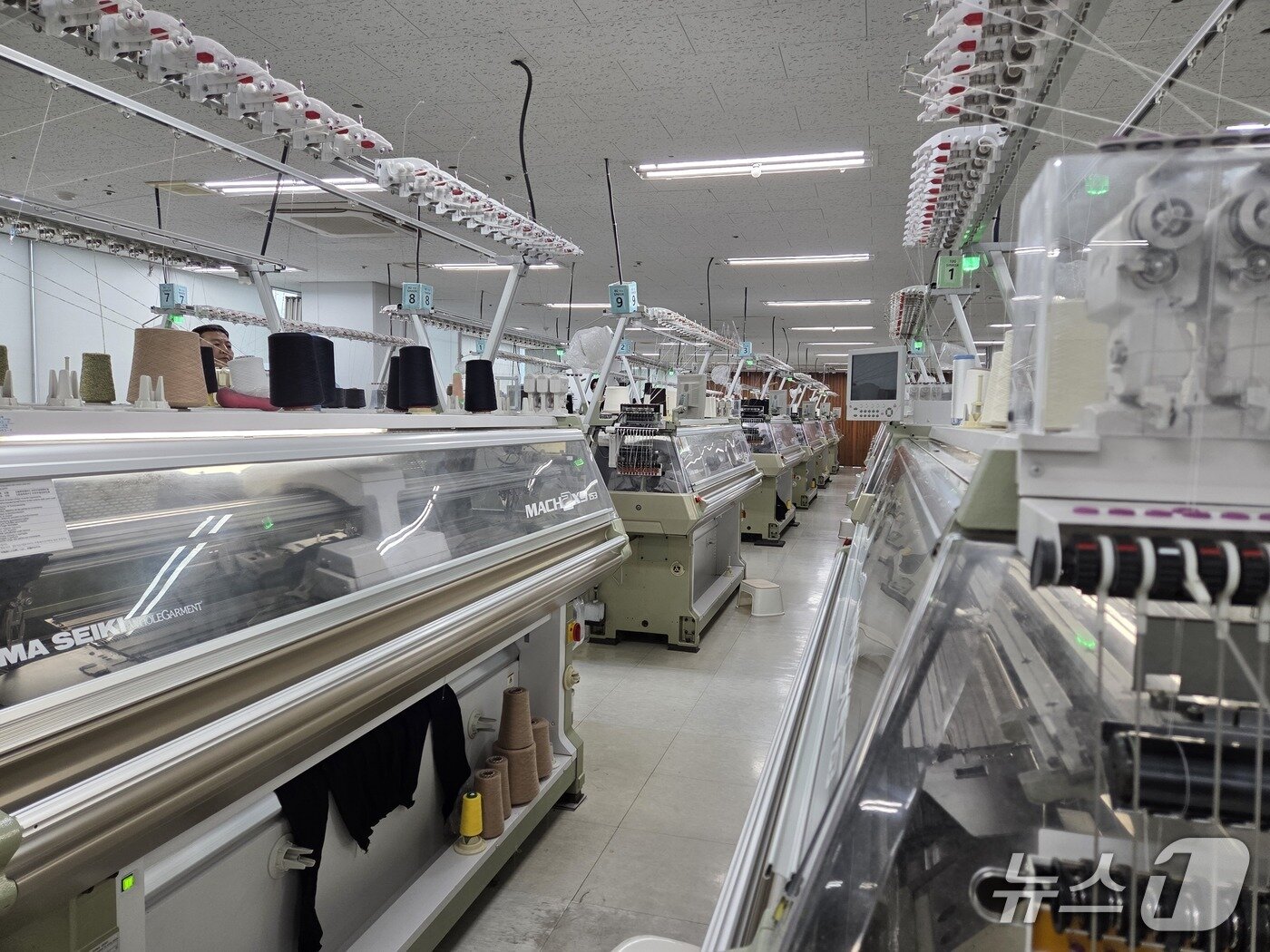 본문 이미지 - 아이디모드가 도입한 스마트제조 기반 의류 생산 공정 2025.8.14/ⓒ뉴스1 이정후 기자