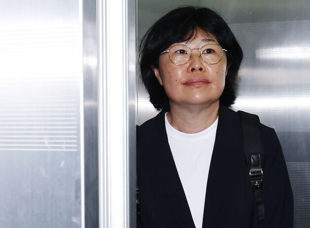 유재은 前관리관, 해병특검 소환…'수사외압' 질문에 침묵