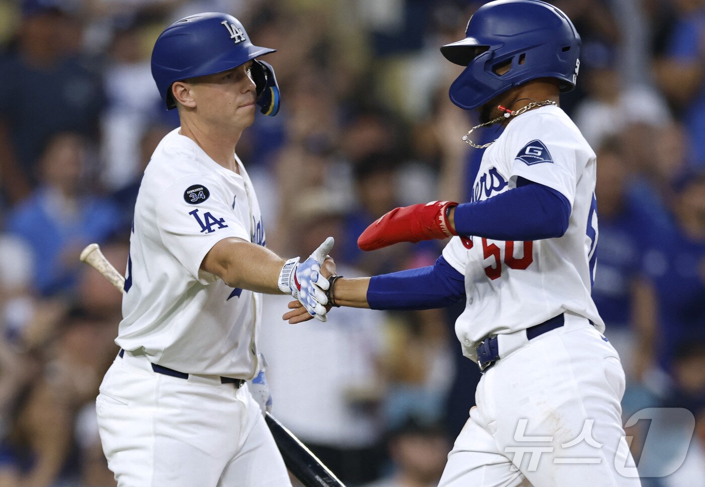 본문 이미지 - LA 다저스가 27일(한국시간) 열린 2025 메이저리그 신시내티 레즈와 홈 경기에서 6-3으로 이겼다. ⓒ AFP=뉴스1