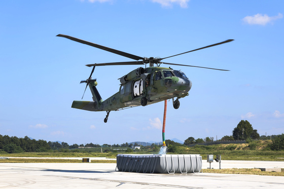 방사청, 육군항공사 헬기 산불 진화 장비 개선 만족도 청취