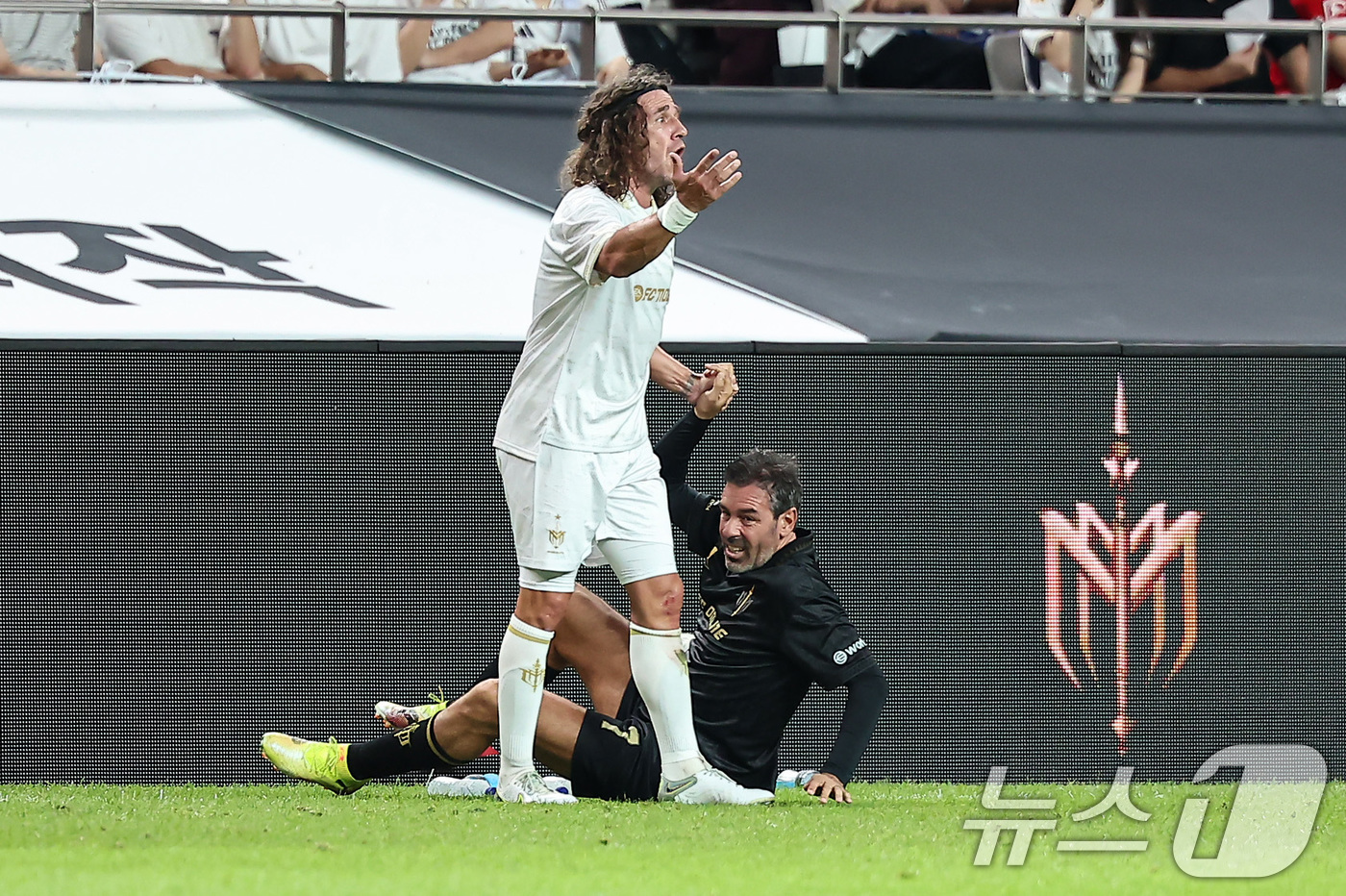 (서울=뉴스1) 김도우 기자 = 14일 오후 서울 마포구 서울월드컵경기장에서 열린 '2025 넥슨 아이콘매치' FC 스피어와 실드 유나이티드의 경기, 실드 유나이티드 카를레스 푸욜 …