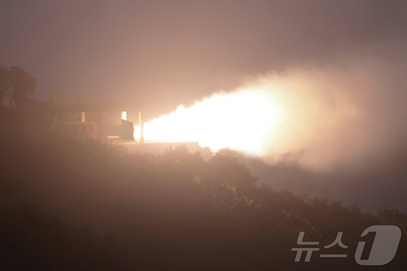 North Korea&#39;s solid-fuel engine ignition test for a new intercontinental ballistic missile &#40;ICBM&#41; conducted on September 8 / Rodong Sinmun