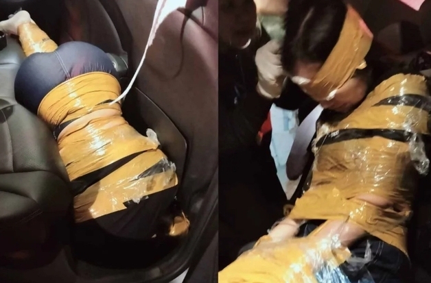 온몸 노란 테이프로 꽁꽁 묶인 여성…주택가 훼손된 벤츠 차량서 발견