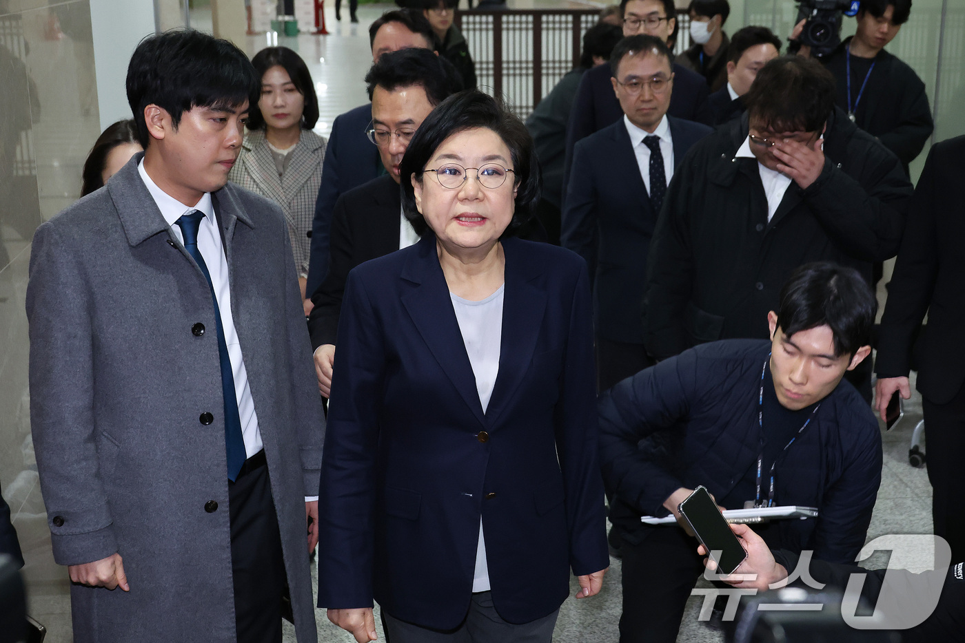 (서울=뉴스1) 신웅수 기자 = 이혜훈 기획예산처 장관 후보자가 19일 서울 여의도 국회에서 취재진의 질의에 답변한 후 대기실로 향하고 있다. 2026.1.19/뉴스1