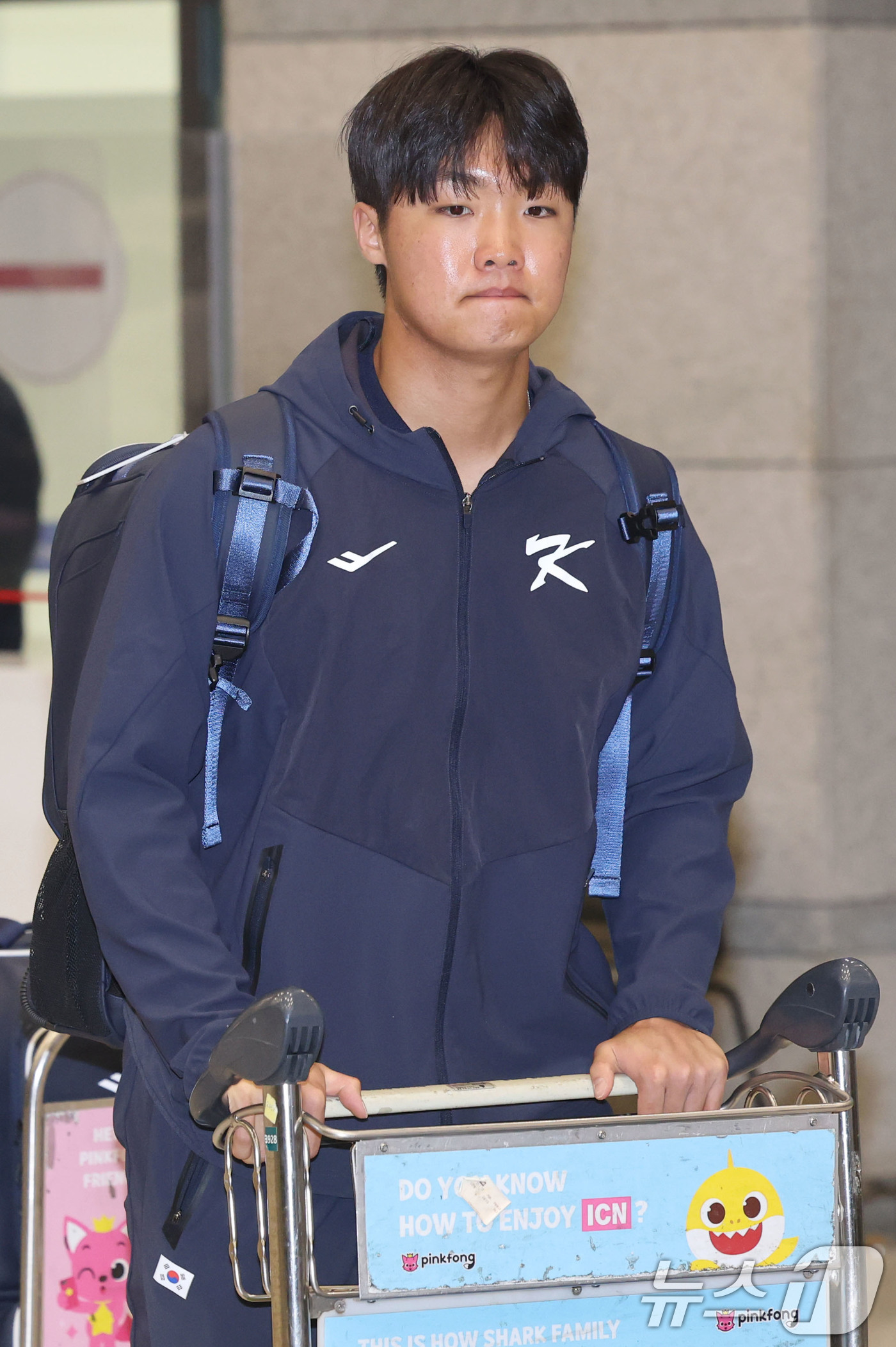 (인천공항=뉴스1) 이광호 기자 = 류지현 감독이 이끄는 야구대표팀의 정우주가 사이판 전지훈련을 마치고 20일 오후 인천국제공항을 통해 귀국하고 있다. 2026.1.20/뉴스1
