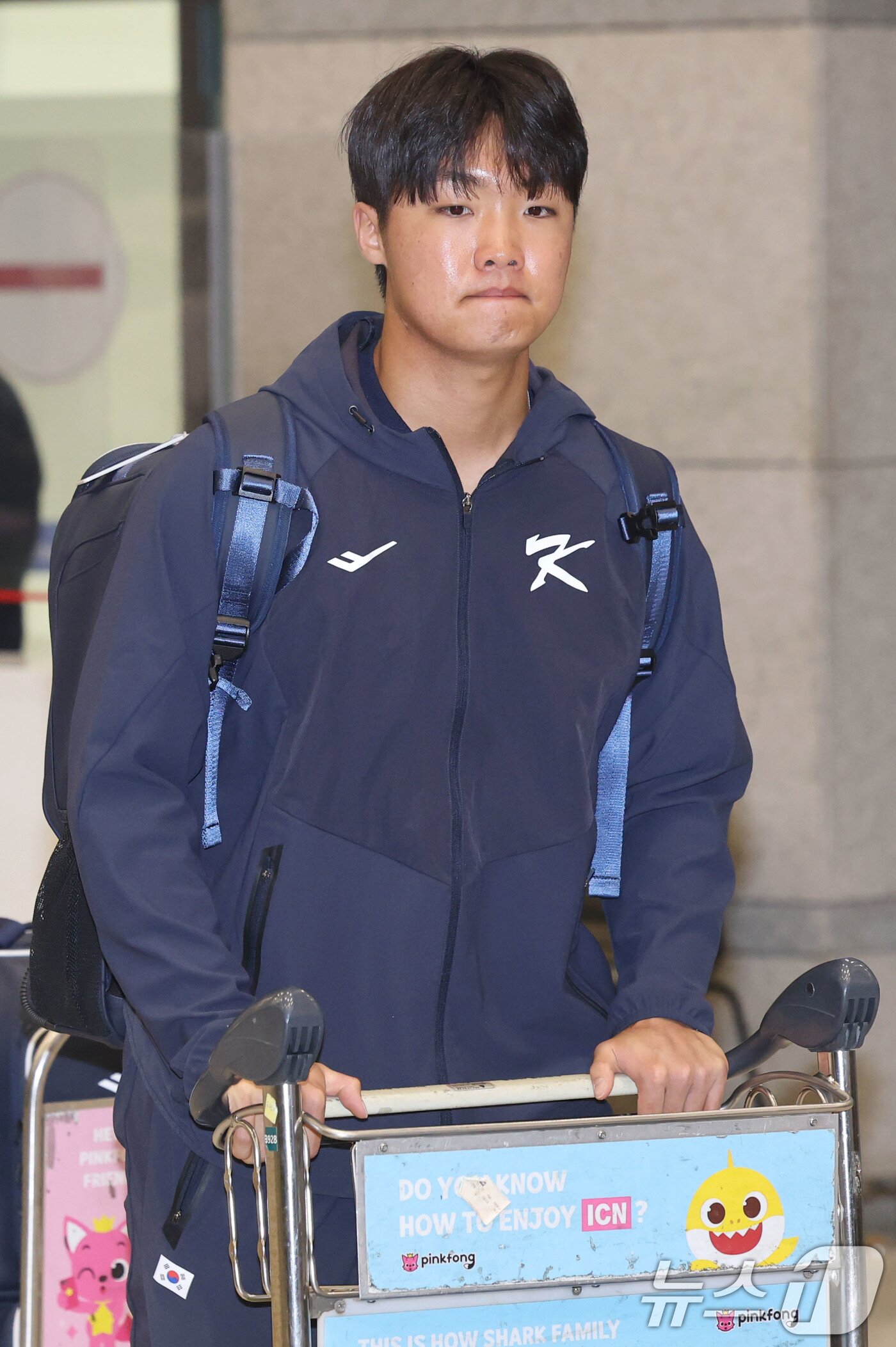 본문 이미지 - 류지현 감독이 이끄는 야구대표팀의 정우주가 사이판 전지훈련을 마치고 20일 오후 인천국제공항을 통해 귀국하고 있다. 2026.1.20/뉴스1 ⓒ News1 이광호 기자