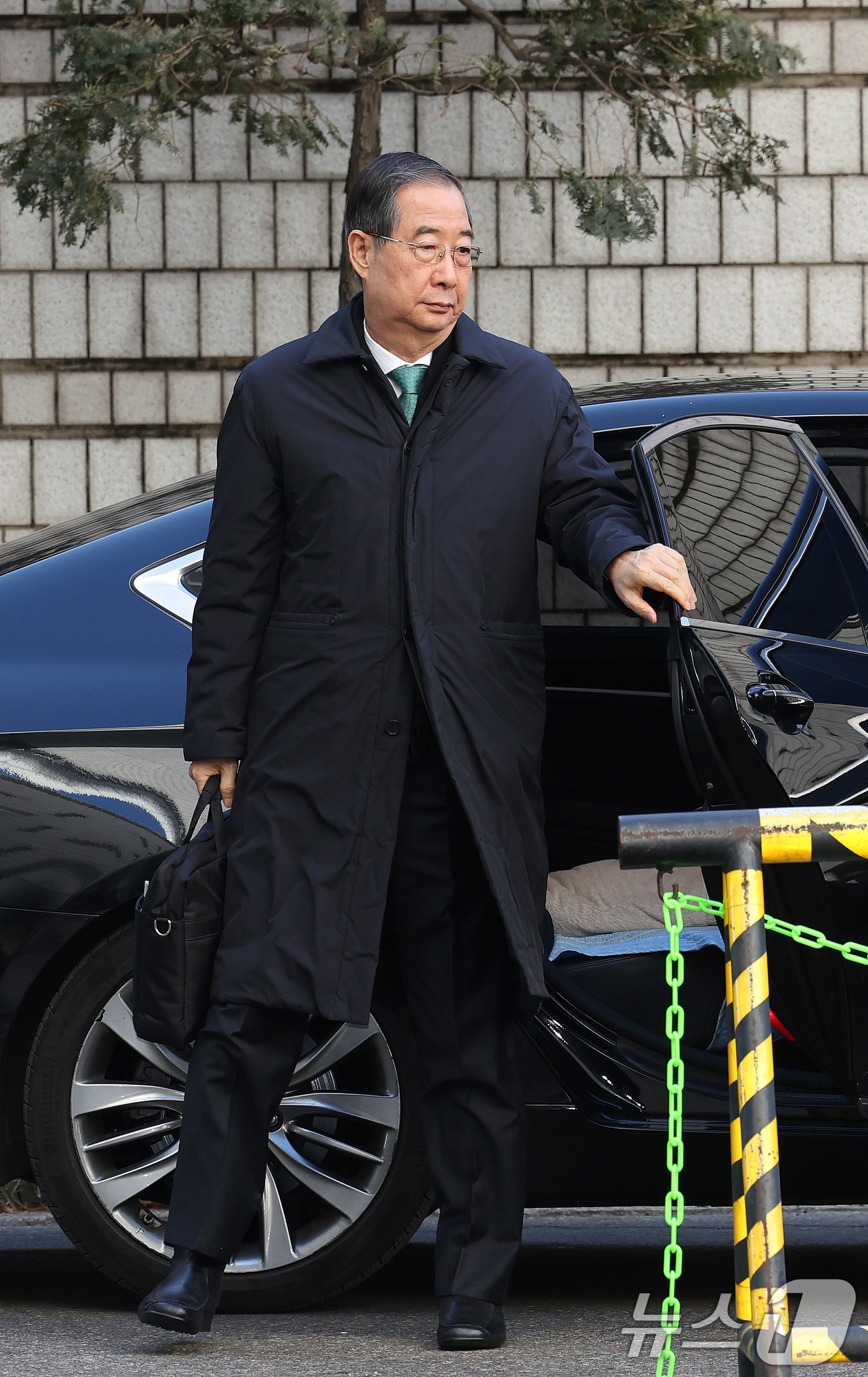 (서울=뉴스1) 박지혜 기자 = 한덕수 전 국무총리가 21일 오후 서울 서초구 서울중앙지법에서 열린 내란 우두머리 방조, 내란 중요임무 종사 혐의 사건 1심 선고공판에 출석하고 있 …