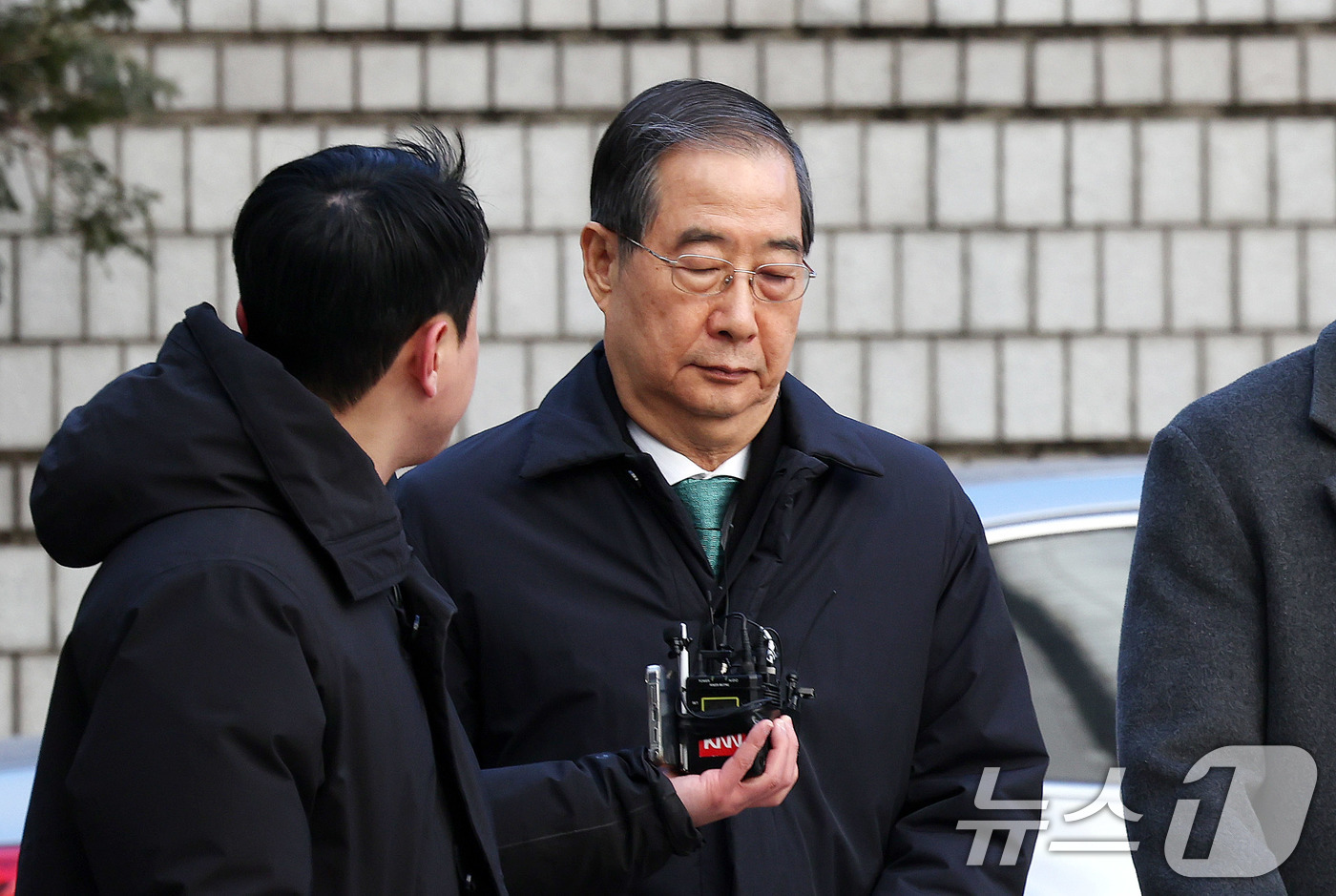 (서울=뉴스1) 박지혜 기자 = 한덕수 전 국무총리가 21일 오후 서울 서초구 서울중앙지법에서 열린 내란 우두머리 방조, 내란 중요임무 종사 혐의 사건 1심 선고공판에 출석하고 있 …