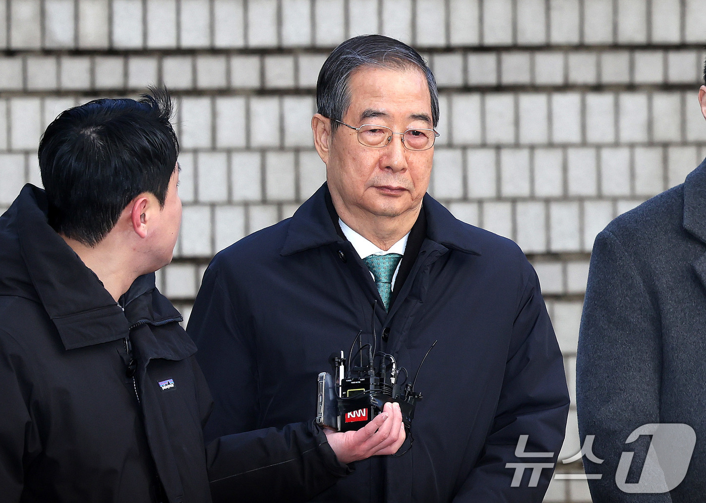 (서울=뉴스1) 박지혜 기자 = 한덕수 전 국무총리가 21일 오후 서울 서초구 서울중앙지법에서 열린 내란 우두머리 방조, 내란 중요임무 종사 혐의 사건 1심 선고공판에 출석하고 있 …