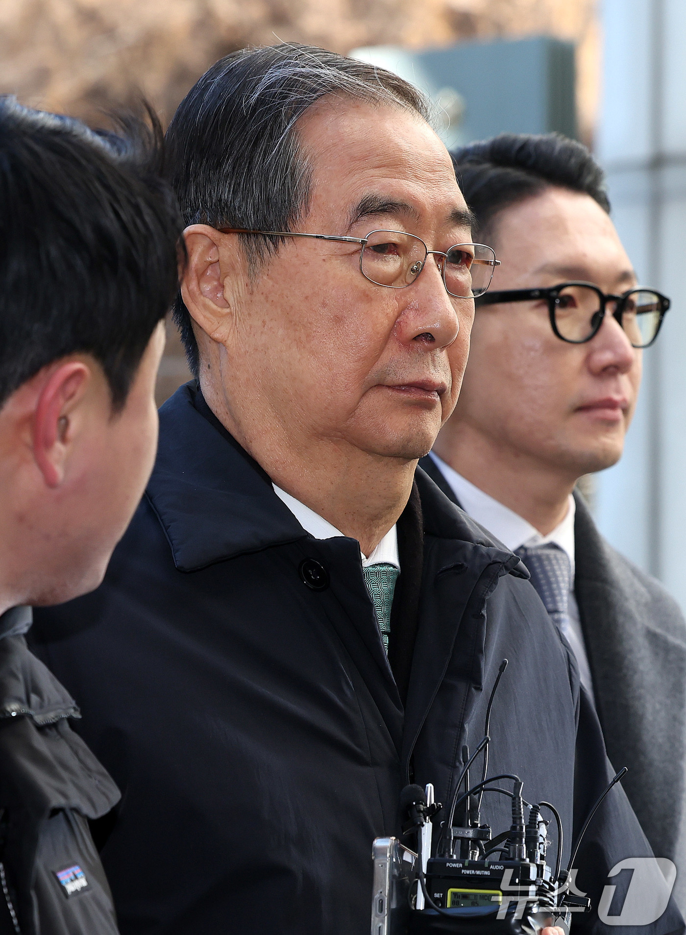 (서울=뉴스1) 박지혜 기자 = 한덕수 전 국무총리가 21일 오후 서울 서초구 서울중앙지법에서 열린 내란 우두머리 방조, 내란 중요임무 종사 혐의 사건 1심 선고공판에 출석하고 있 …