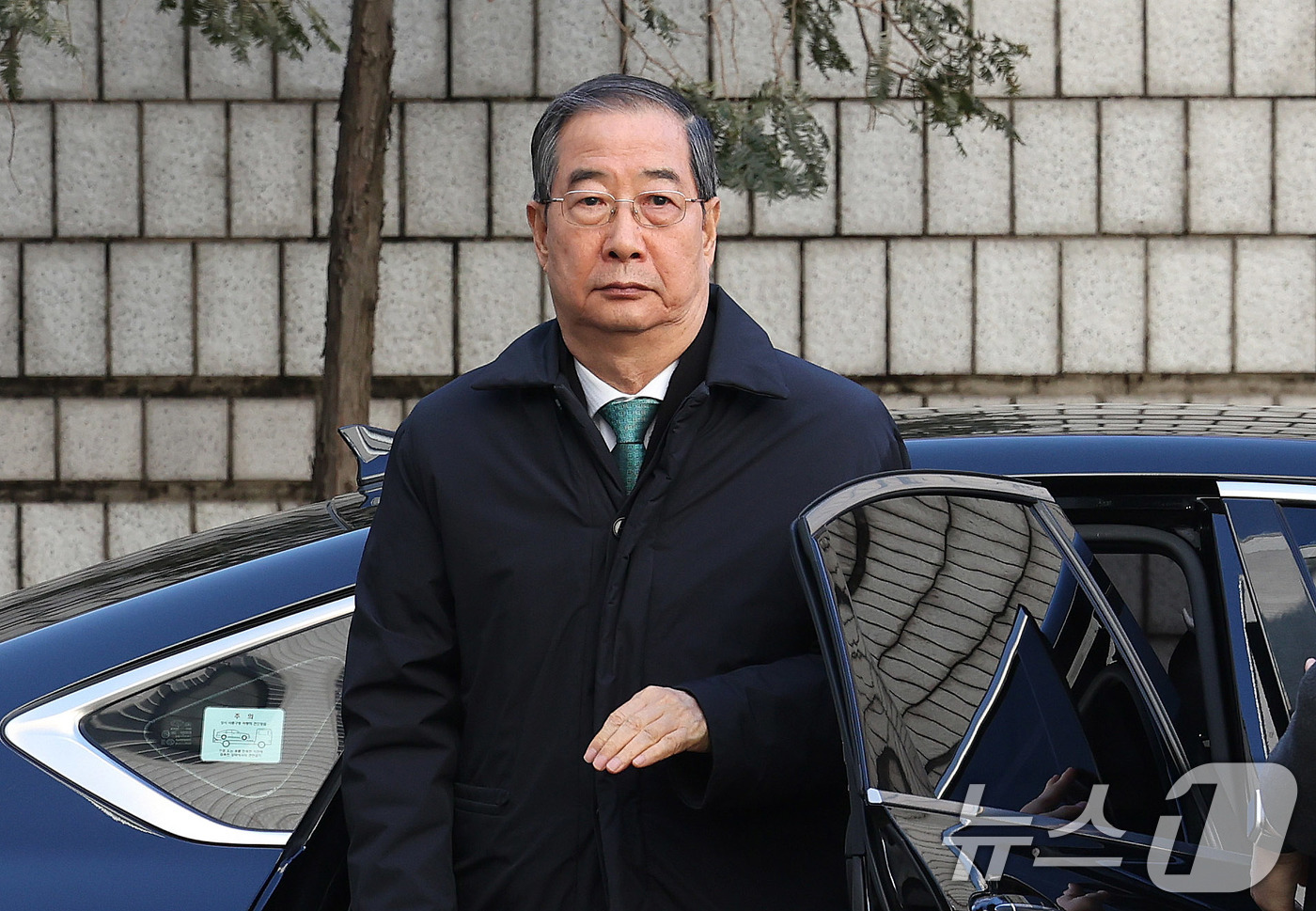 (서울=뉴스1) 박지혜 기자 = 한덕수 전 국무총리가 21일 오후 서울 서초구 서울중앙지법에서 열린 내란 우두머리 방조, 내란 중요임무 종사 혐의 사건 1심 선고공판에 출석하고 있 …