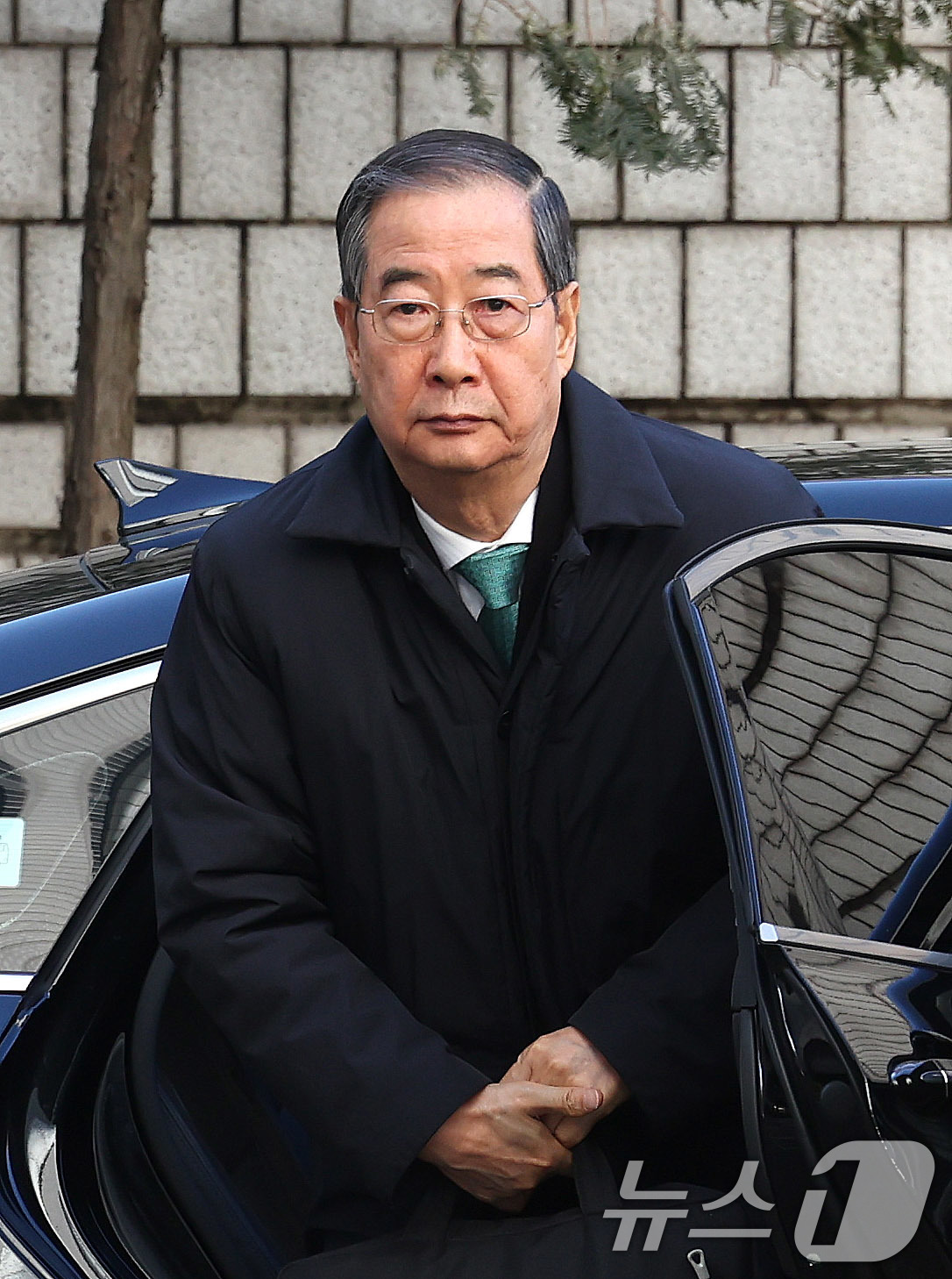 (서울=뉴스1) 박지혜 기자 = 한덕수 전 국무총리가 21일 오후 서울 서초구 서울중앙지법에서 열린 내란 우두머리 방조, 내란 중요임무 종사 혐의 사건 1심 선고공판에 출석하고 있 …