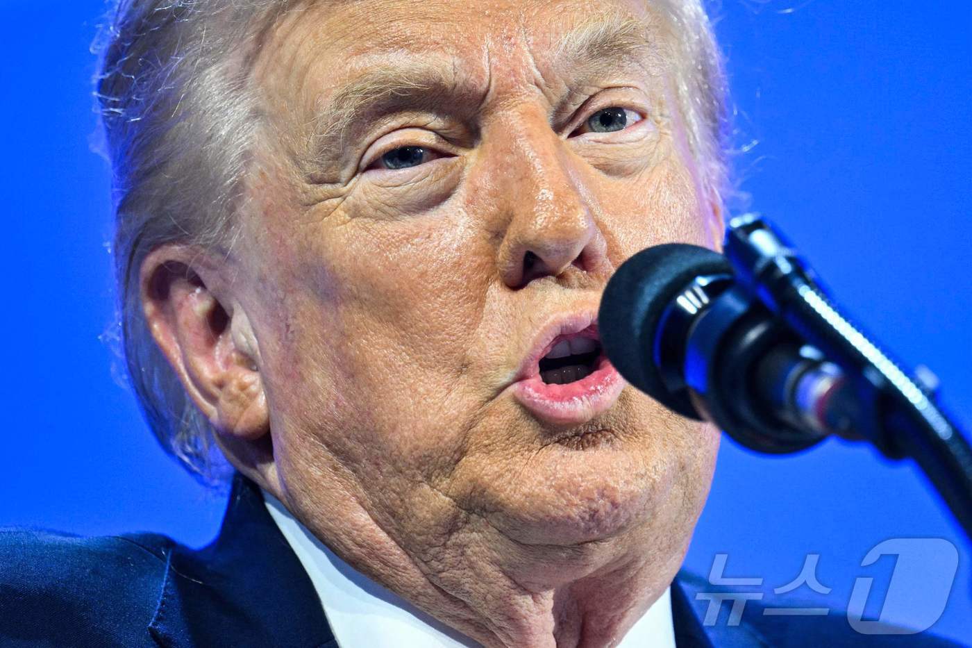 본문 이미지 - 도널드 트럼프 미국 대통령이 21일(현지시간) 스위스 다보스에서 열린 세계경제포럼(WEF) 연례총회(다보스포럼)에서 특별 연설을 하고 있다. 2026.01.21. ⓒ AFP=뉴스1 ⓒ News1 이정환 기자