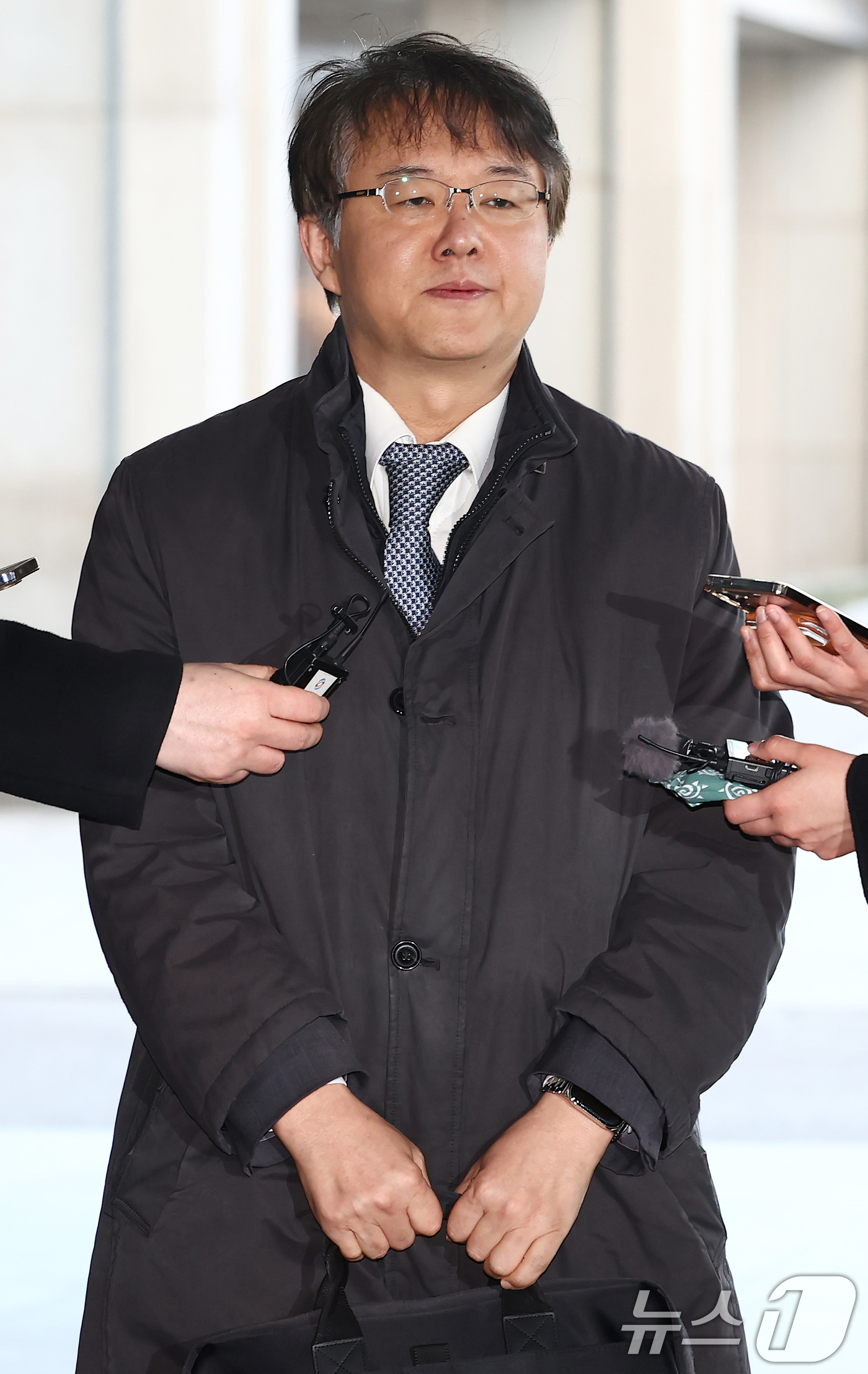 (서울=뉴스1) 김민지 기자 = 통일교와 신천지의 정교유착 의혹을 수사하는 합동수사본부를 이끌게 된 김태훈 본부장이 8일 오전 서울 서초구 서울고등검찰청으로 출근하며 수사에 임하는 …