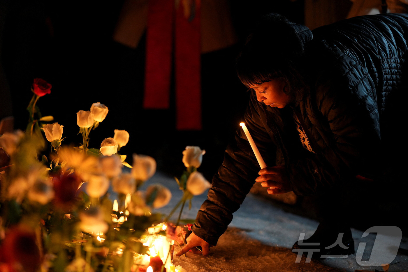 (미니애폴리스 로이터=뉴스1) 이정환 기자 = 7일(현지시간) 미국 미네소타주 미니애폴리스에서 한 여성이 미 이민세관단속국(ICE) 요원의 총격으로 차량 안에서 사망한 37세 여성 …