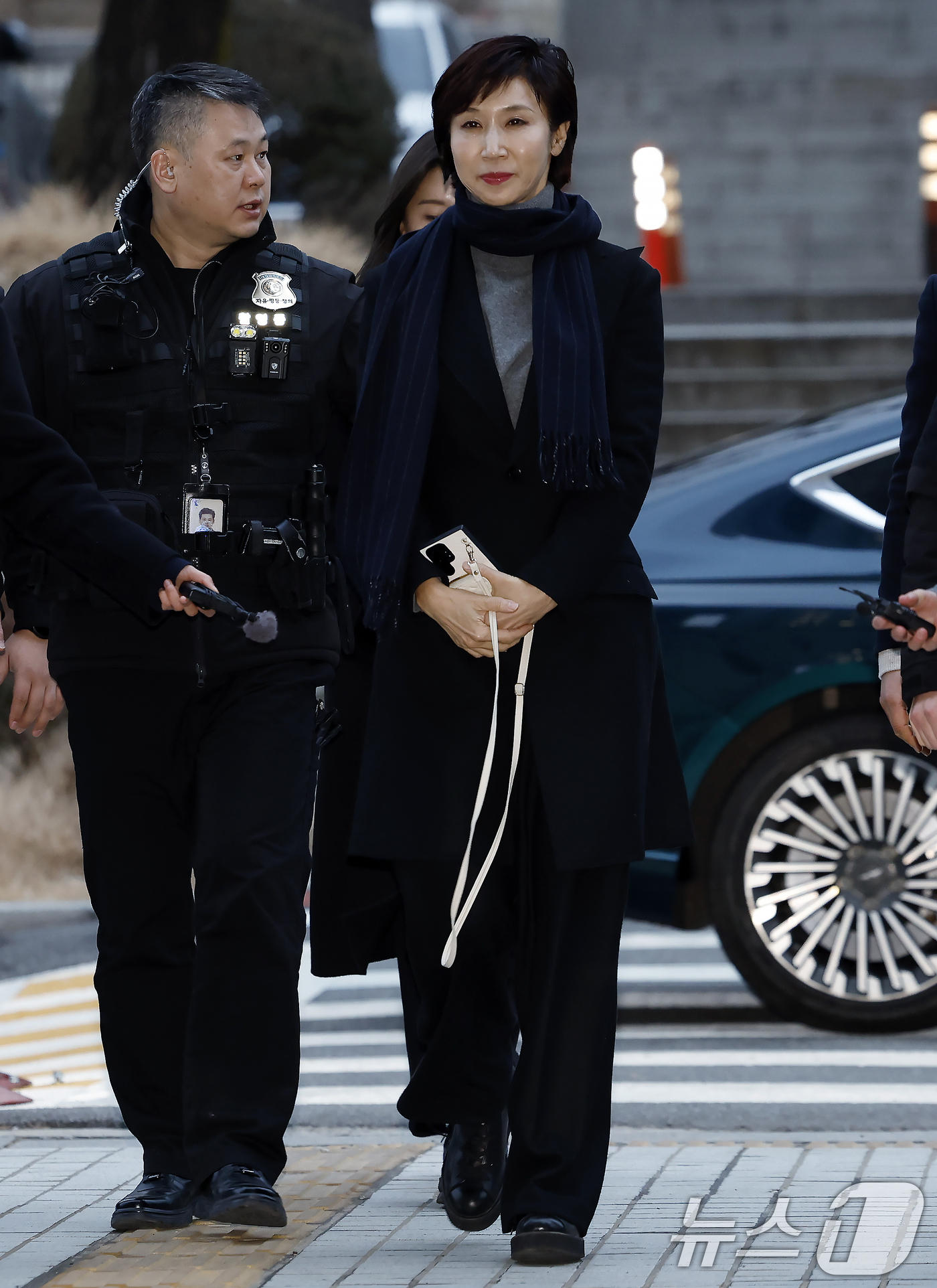 (서울=뉴스1) 박정호 기자 = 노소영 아트센터 나비 관장이 9일 오후 서울시 서초구 서초동 서울고등법원에서 열린 재산분할 소송 파기환송심 첫 변론기일에 참석하고 있다.  2026 …