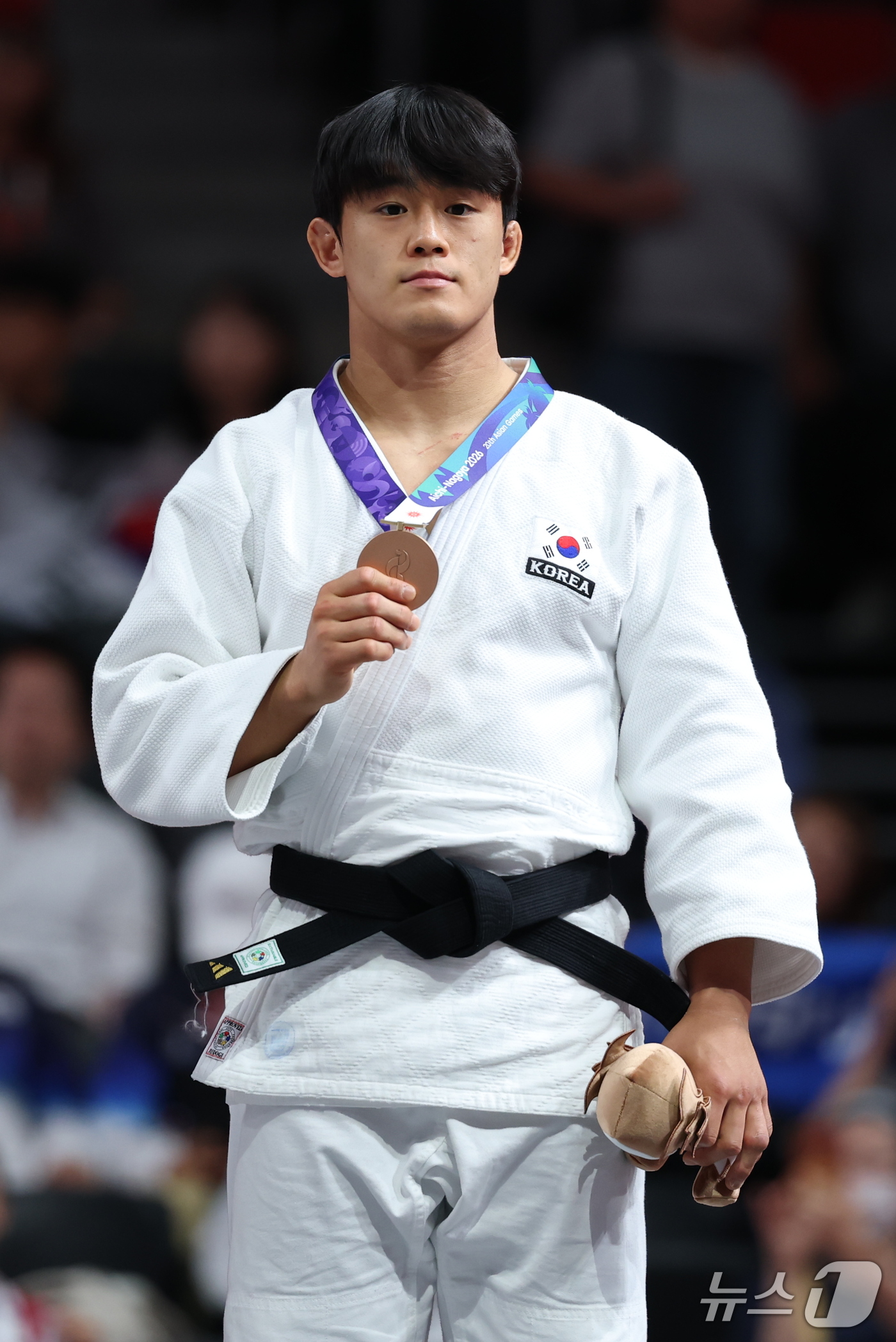 (나고야=뉴스1) 안은나 기자 = 대한민국 김종훈이 2일 일본 아이치 인터내셔널 아레나에서 열린 2026 아이치·나고야 아시안게임 유도 남자 -90kg급 시상식에서 동메달을 목에 …