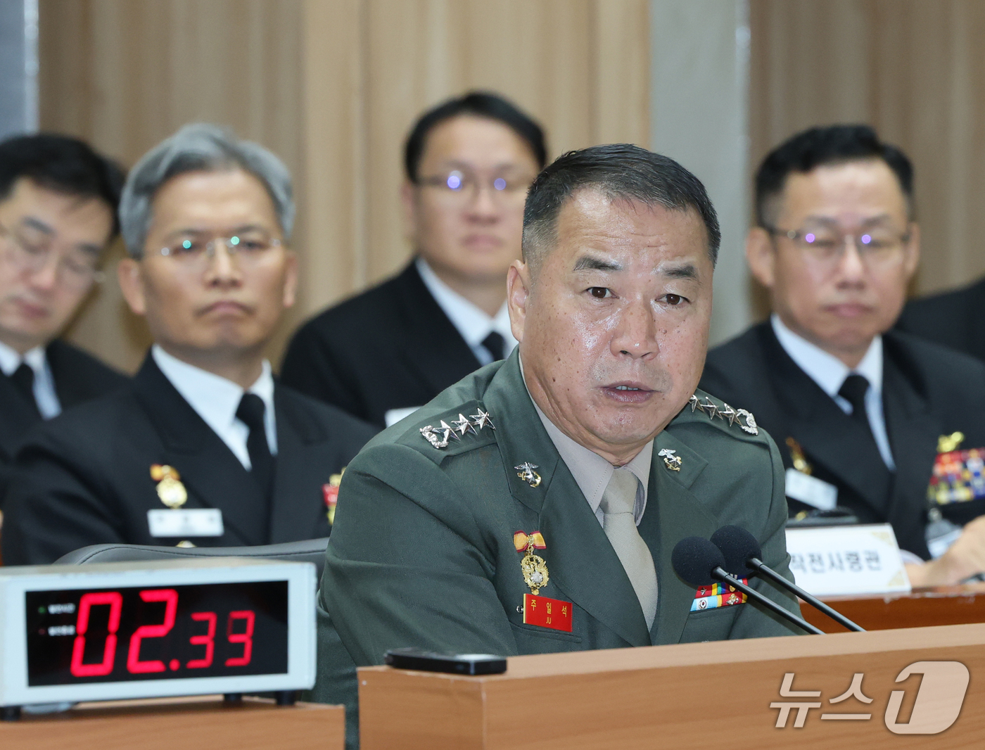 (계룡=뉴스1) 김기태 기자 = 주일석 해병대사령관이 20일 충남 계룡대에서 열린 국회 국방위원회의 해군본부에 대한 국정감사에서 질의에 답변하고 있다. 2026.10.20/뉴스1