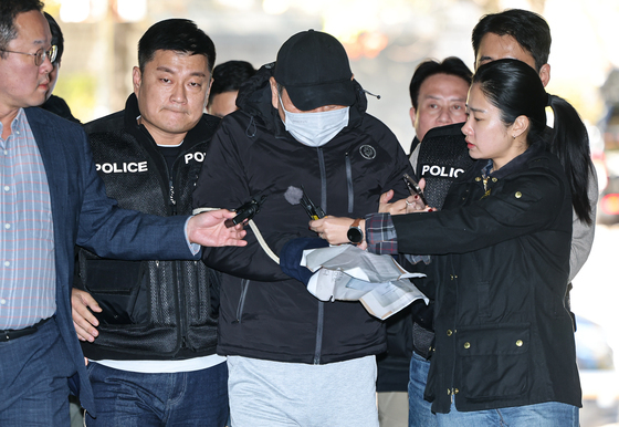 법정 향하는 역삼동 연쇄방화 피의자
