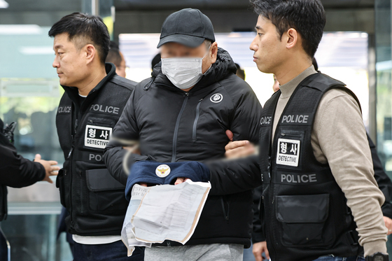 법정 향하는 역삼동 연쇄방화 피의자