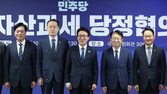 당정, 가상자산 과세 추가유예 결론 못내…"좀더 점검"