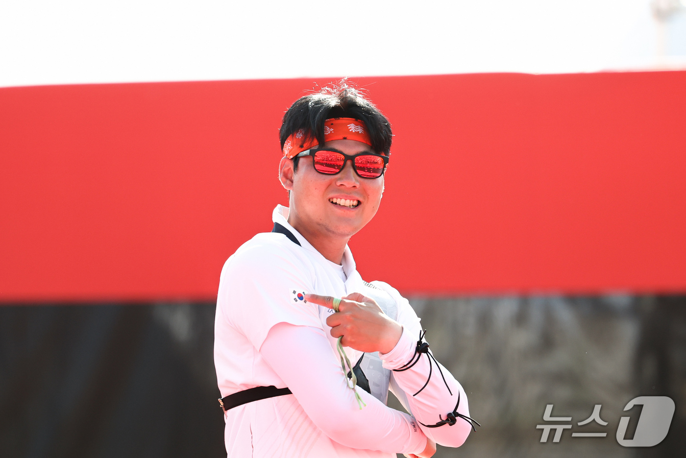 (오카자키=뉴스1) 김도우 기자 = 대한민국 이우석이 3일 일본 오카자키 중앙종합공원 다목적광장에서 열린 2026 아이치·나고야 아시안게임 양궁 리커브 남자 개인전 결승에서 일본 …