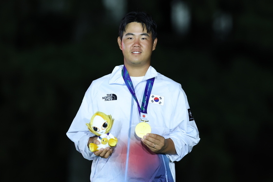 김주형, 금빛 미소