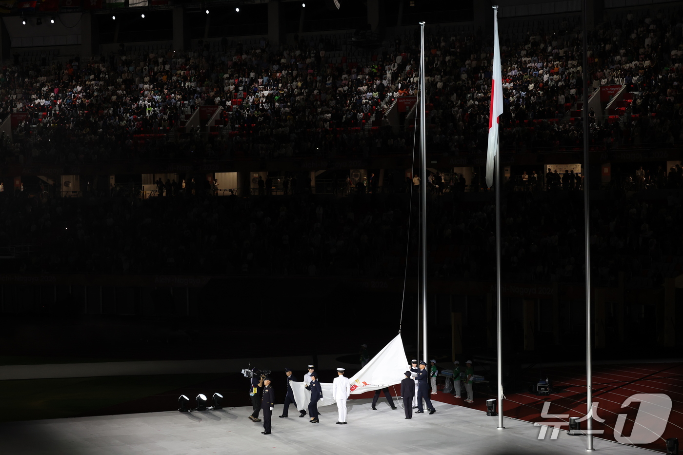 (나고야=뉴스1) 김민지 기자 = 4일 오후 일본 나고야 팔로마 미즈호 스타디움에서 열린 2026 아이치·나고야 아시안게임 폐회식에서 아시아올림픽평의회(OCA) 대회기가 하강하고 …