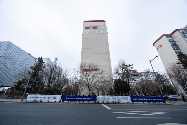 DL이앤씨, 압구정5구역 출근길 인사…입찰 참여 출사표