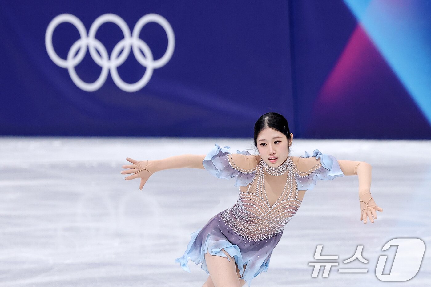 본문 이미지 - 피겨 이해인이 17일(현지시간) 이탈리아 밀라노 아이스스케이팅 아레나에서 열린 2026 밀라노·코르티나담페초 동계올림픽 피겨 스케이팅 여자 싱글 쇼트 프로그램에서 연기를 펼치고 있다. 2026.2.18 ⓒ 뉴스1 김성진 기자