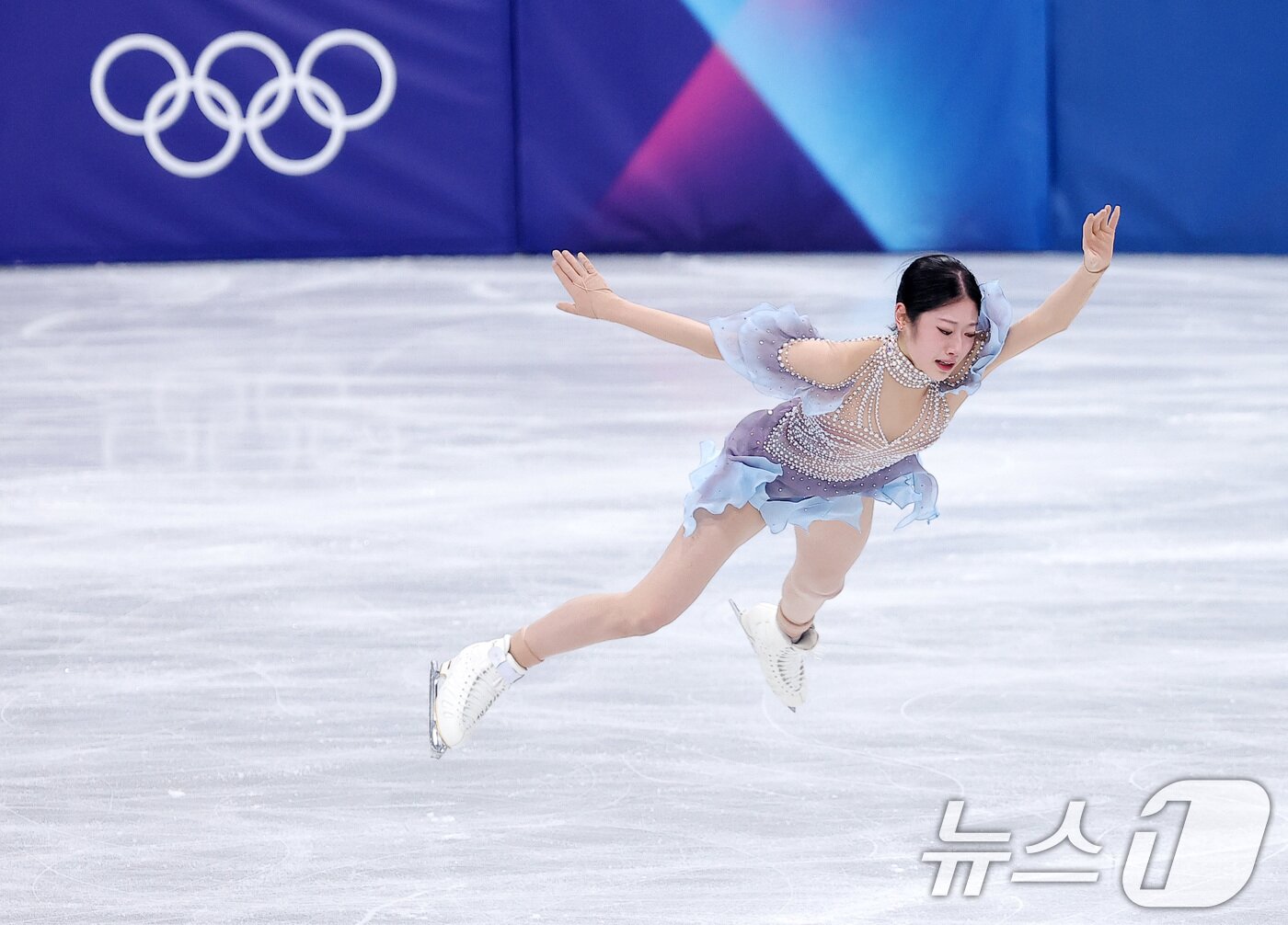 본문 이미지 - 피겨 이해인이 17일(현지시간) 이탈리아 밀라노 아이스스케이팅 아레나에서 열린 2026 밀라노·코르티나담페초 동계올림픽 피겨 스케이팅 여자 싱글 쇼트 프로그램에서 연기를 펼치고 있다. 2026.2.18 ⓒ 뉴스1 김성진 기자