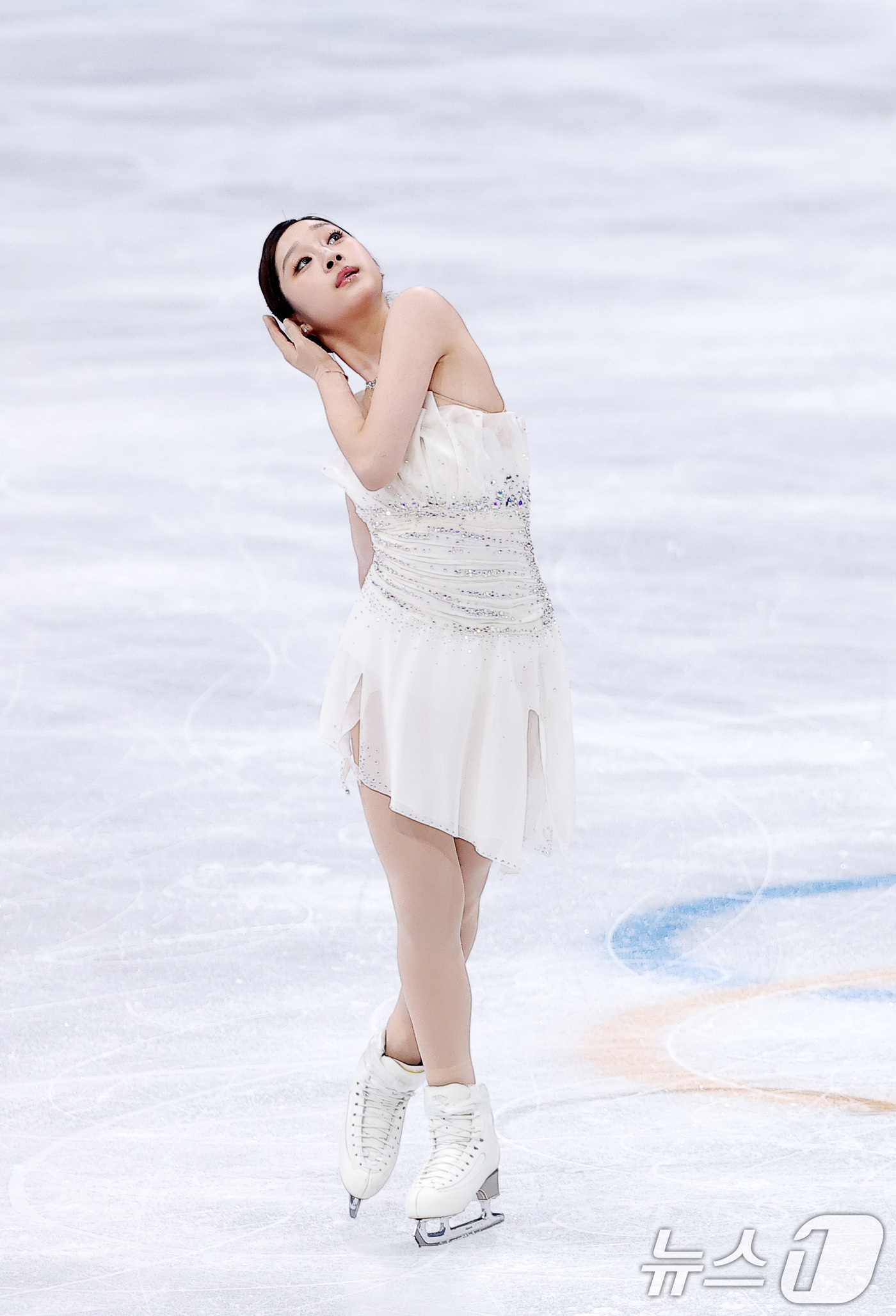 (밀라노=뉴스1) 김성진 기자 = 피겨 신지아가 19일(현지시간) 이탈리아 밀라노 아이스스케이팅 아레나에서 열린 2026 밀라노·코르티나담페초 동계올림픽 피겨 스케이팅 여자 싱글 …