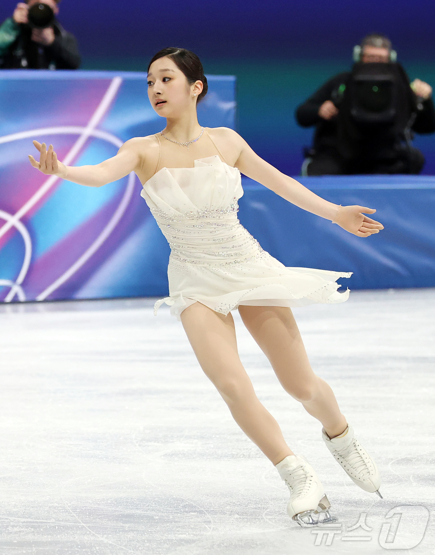 (밀라노=뉴스1) 김진환 기자 = 피겨 신지아가 19일(현지시간) 이탈리아 밀라노 아이스스케이팅 아레나에서 열린 2026 밀라노·코르티나담페초 동계올림픽 피겨 스케이팅 여자 싱글 …