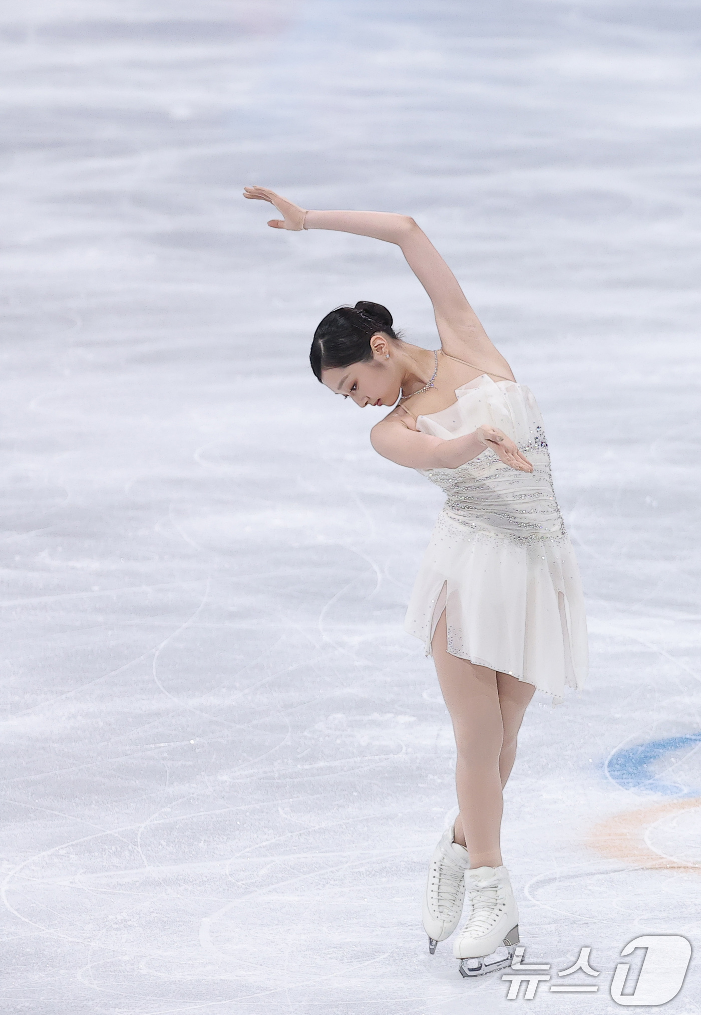 (밀라노=뉴스1) 김성진 기자 = 피겨 신지아가 19일(현지시간) 이탈리아 밀라노 아이스스케이팅 아레나에서 열린 2026 밀라노·코르티나담페초 동계올림픽 피겨 스케이팅 여자 싱글 …