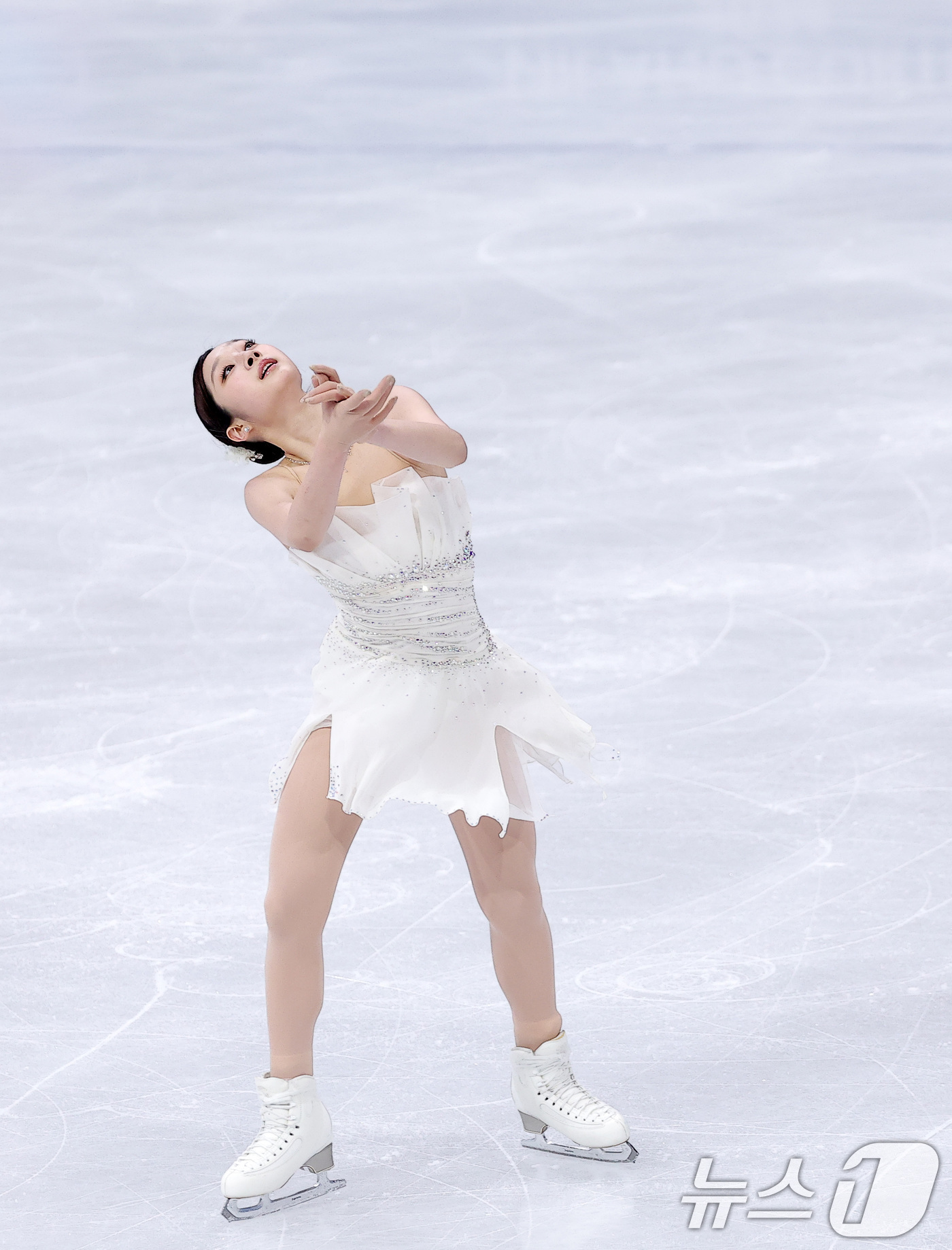 (밀라노=뉴스1) 김성진 기자 = 피겨 신지아가 19일(현지시간) 이탈리아 밀라노 아이스스케이팅 아레나에서 열린 2026 밀라노·코르티나담페초 동계올림픽 피겨 스케이팅 여자 싱글 …