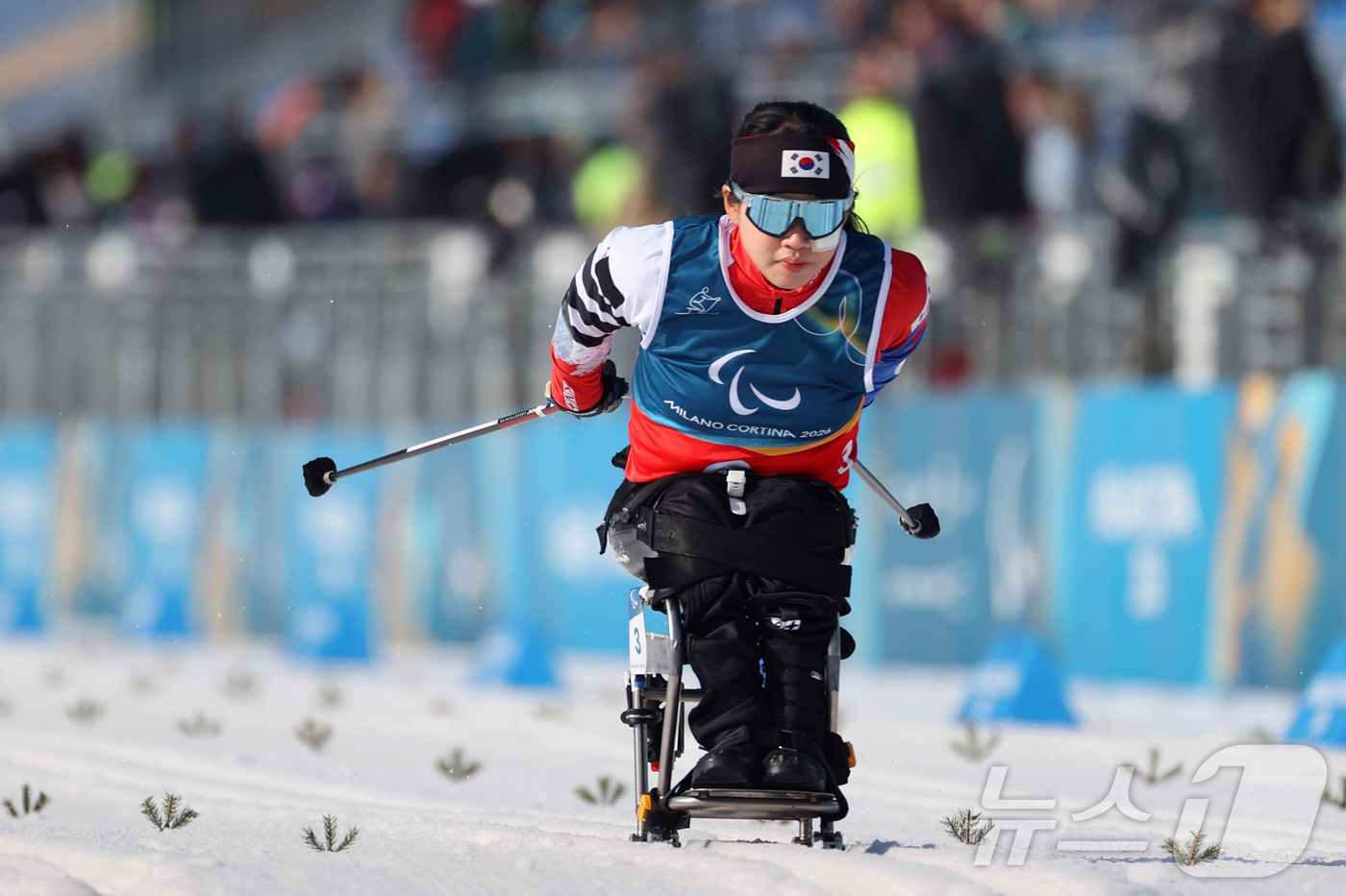 (서울=뉴스1) = 김윤지가 10일(현지시간) 이탈리아 테세로 크로스컨트리 스타디움에서 열린 2026 밀라노·코르티나 동계 패럴림픽 크로스컨트리 스키 여자 스프린트 좌식 결선에서 …