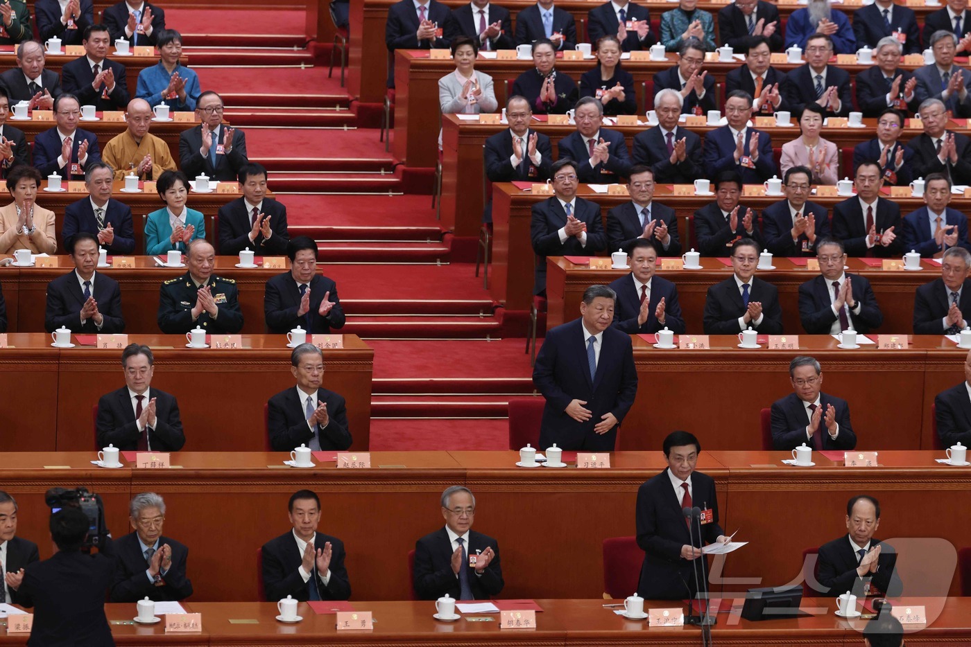 (AFP=뉴스1) 정은지 특파원 = 시진핑 중국 국가주석(가운데)가 11일 오전 베이징 인민대회당에서 폐막한 전국정치협상회의 폐막식에 참석했다. 2026.3.11ⓒ AFP=뉴스1
