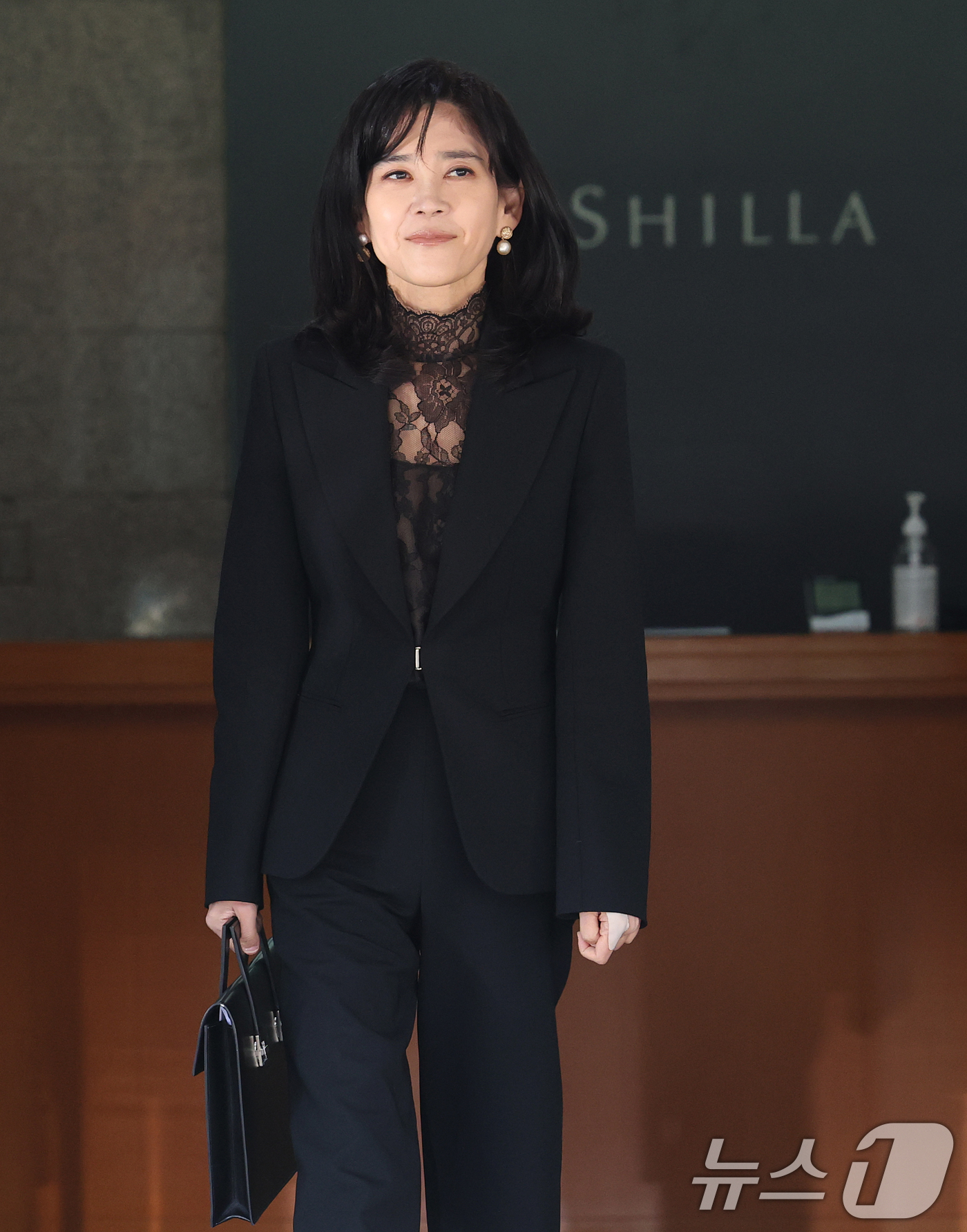 (서울=뉴스1) 오대일 기자 = 이부진 호텔신라 사장이 19일 오전 서울 중구 삼성전자 장충동 사옥에서 열린 호텔신라 주주총회에 참석한 후 이동하고 있다.  2026.3.19/뉴스 …