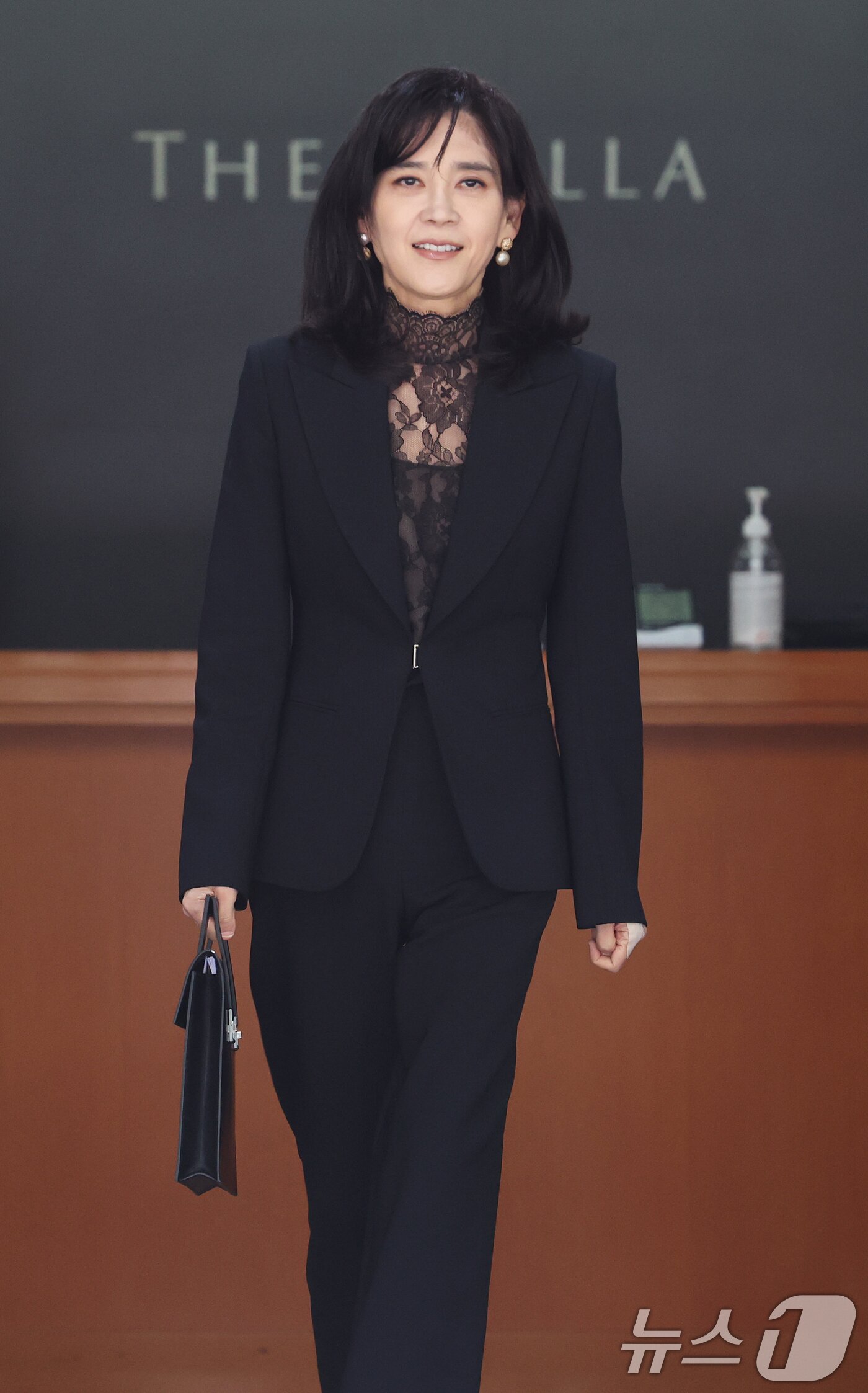 본문 이미지 - 이부진 호텔신라 사장이 19일 오전 서울 중구 삼성전자 장충동 사옥에서 열린 호텔신라 정기 주주총회에 참석한 후 이동하고 있다. 2026.3.19 ⓒ 뉴스1 오대일 기자