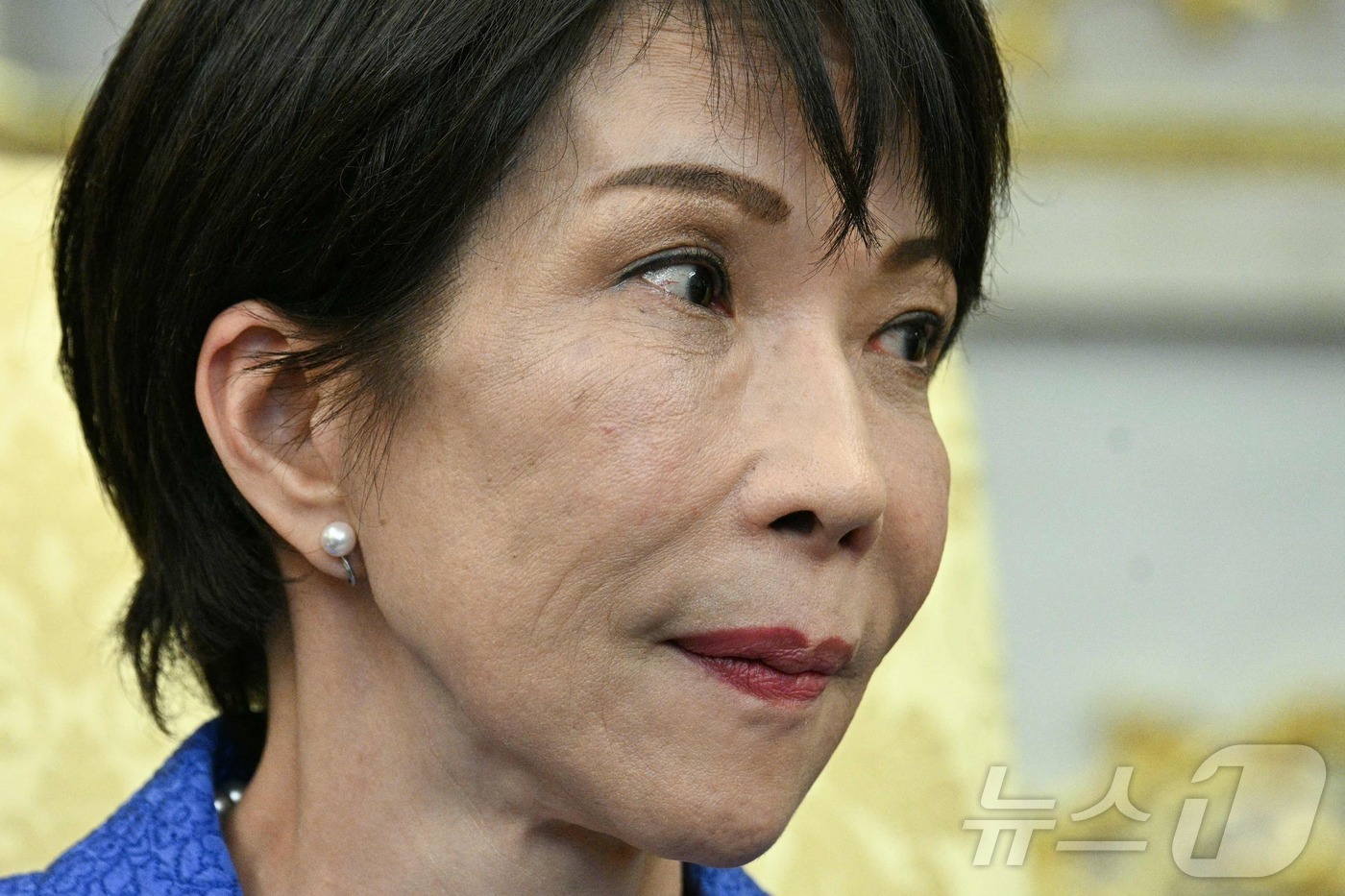 (워싱턴DC AFP=뉴스1) 윤다정 기자 = 다카이치 사나에 일본 총리가 19일(현지시간) 미 워싱턴DC 백악관에서 열린 미일정상회담에서 도널드 트럼프 미국 대통령 쪽을 바라보고 …